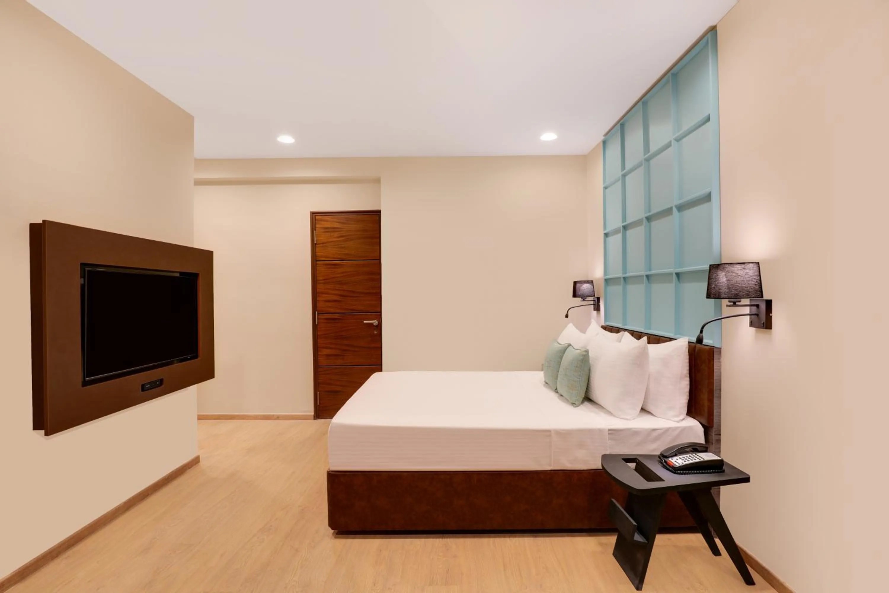 Photo of the whole room, Bed in Lemon Tree Suites, Whitefield, Bengaluru