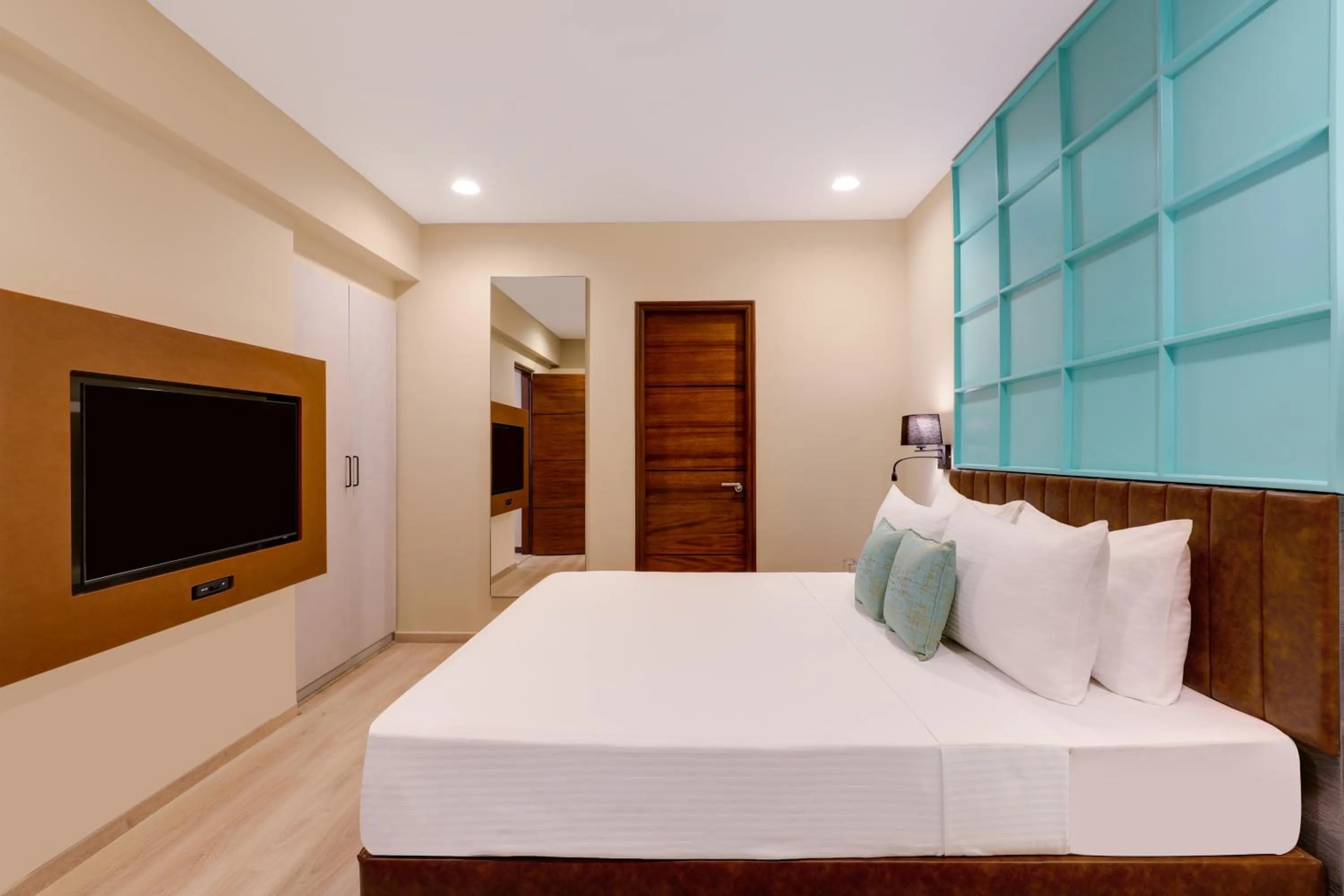 Bedroom, Bed in Lemon Tree Suites, Whitefield, Bengaluru