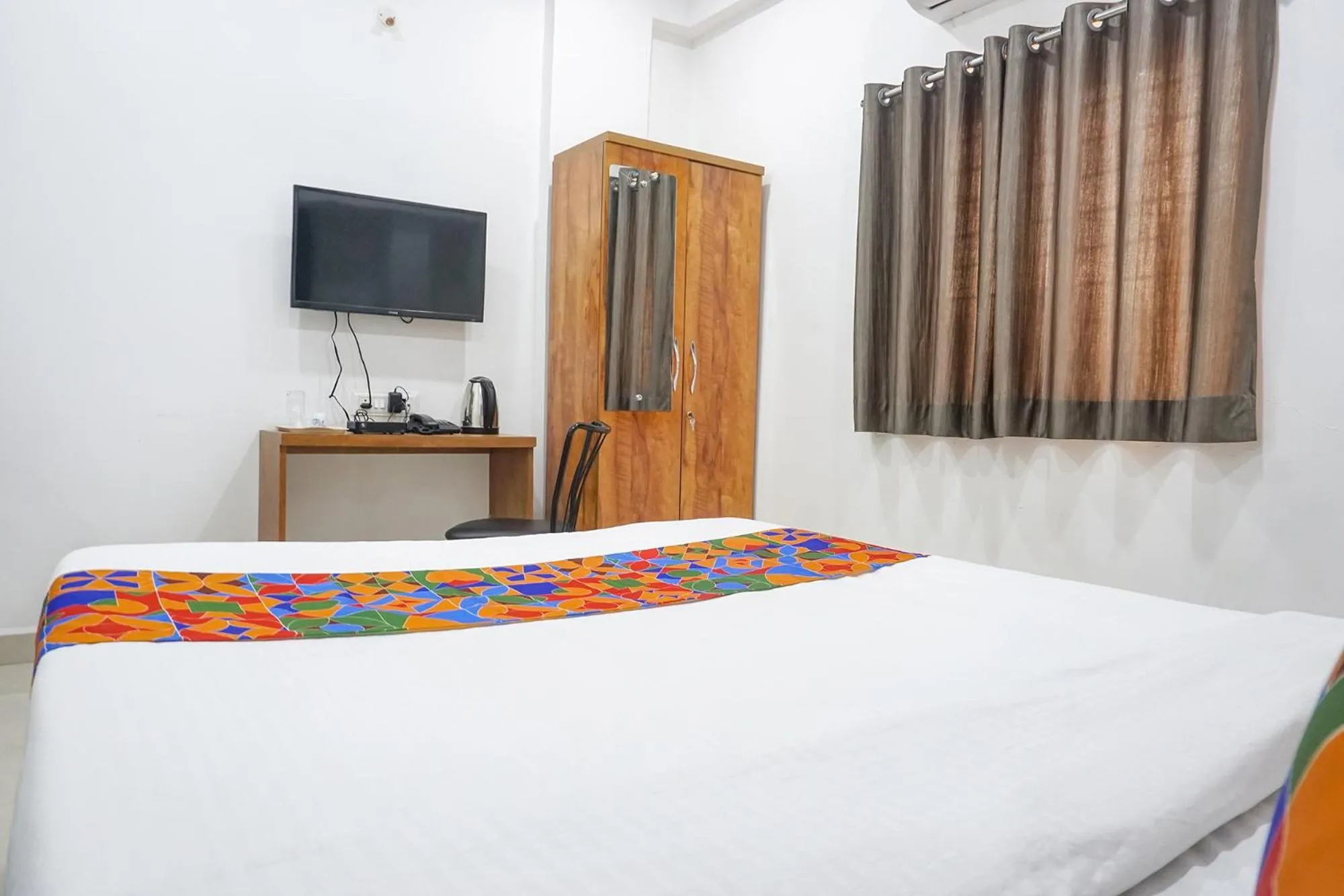 Bed in FabHotel The White House Inn - EON IT Park