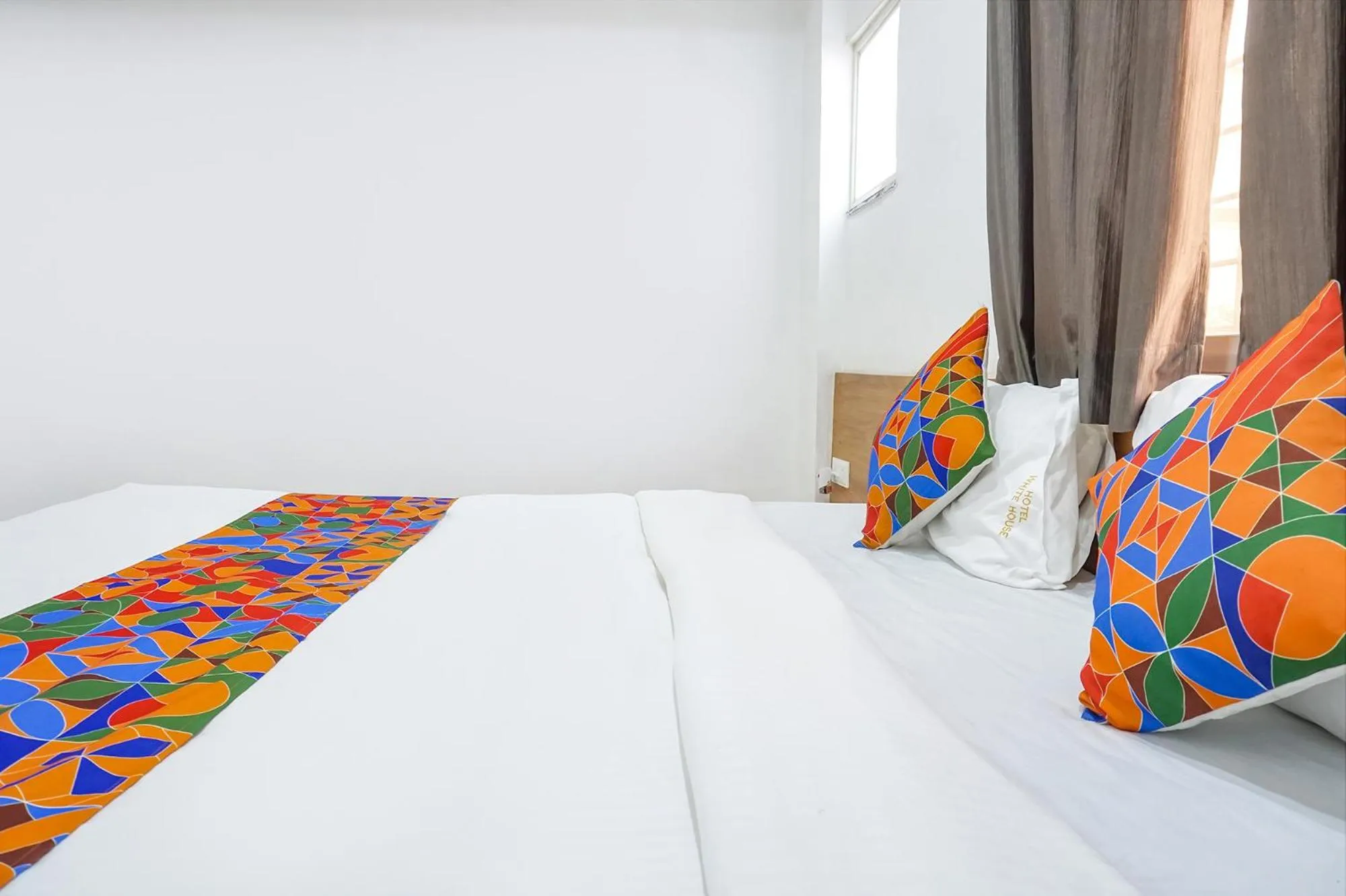 Bed in FabHotel The White House Inn - EON IT Park