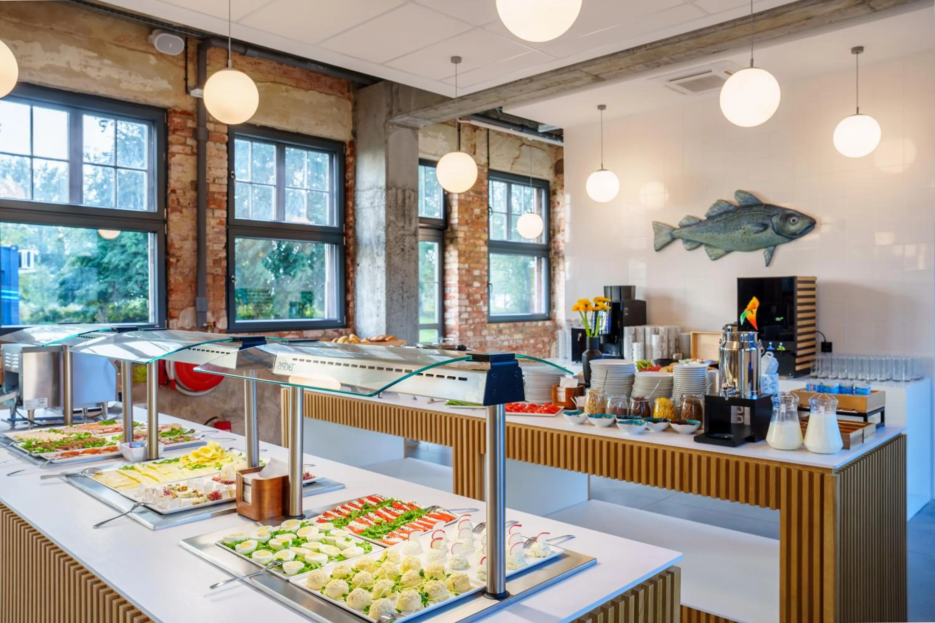 Restaurant/places to eat in Hotel ARCHE Fabryka Samolotów w Mielnie