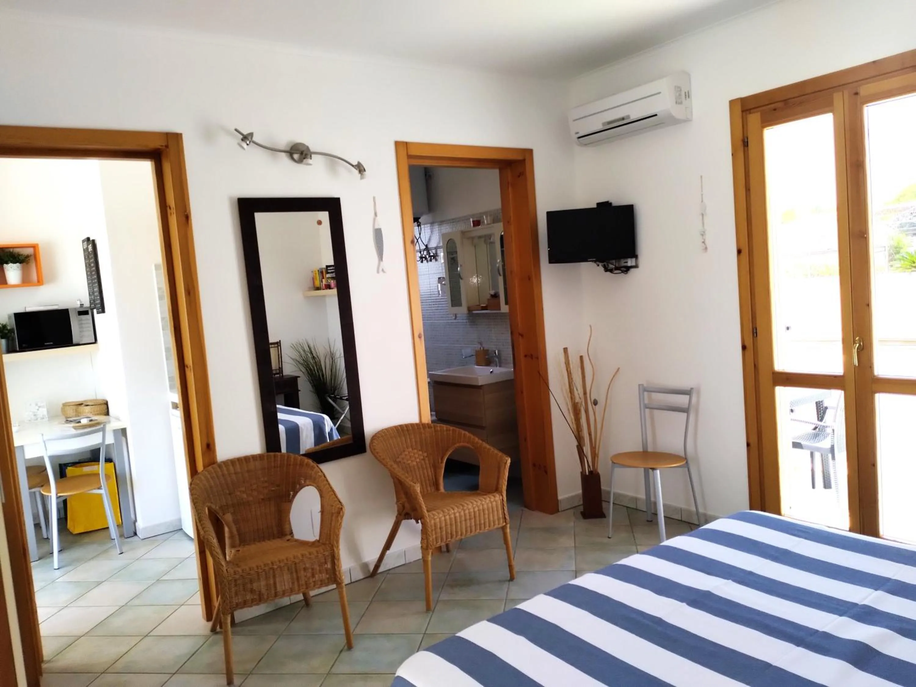Living room, Bed in Residence Orsa Minore