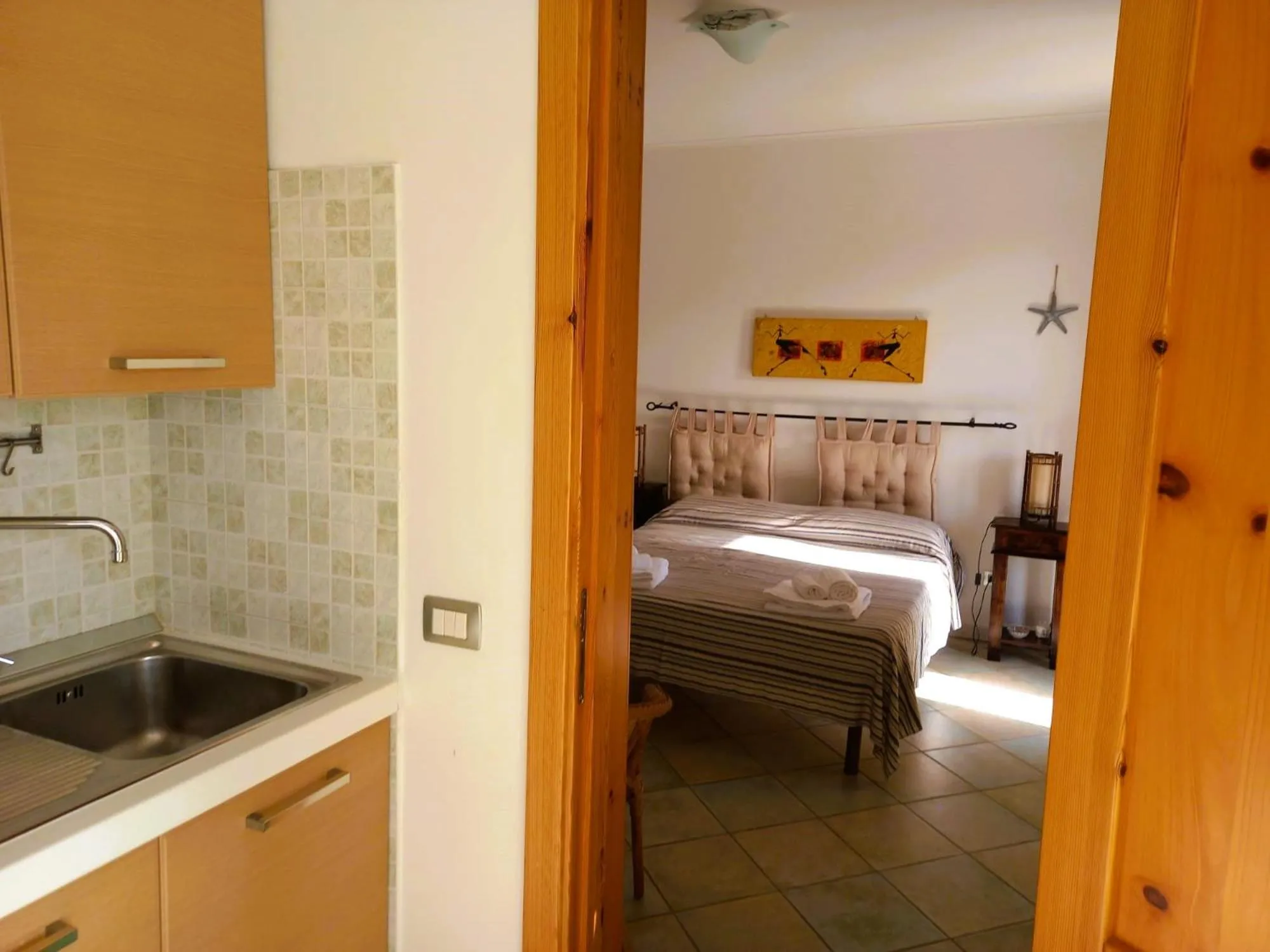 Kitchen or kitchenette, Bed in Residence Orsa Minore