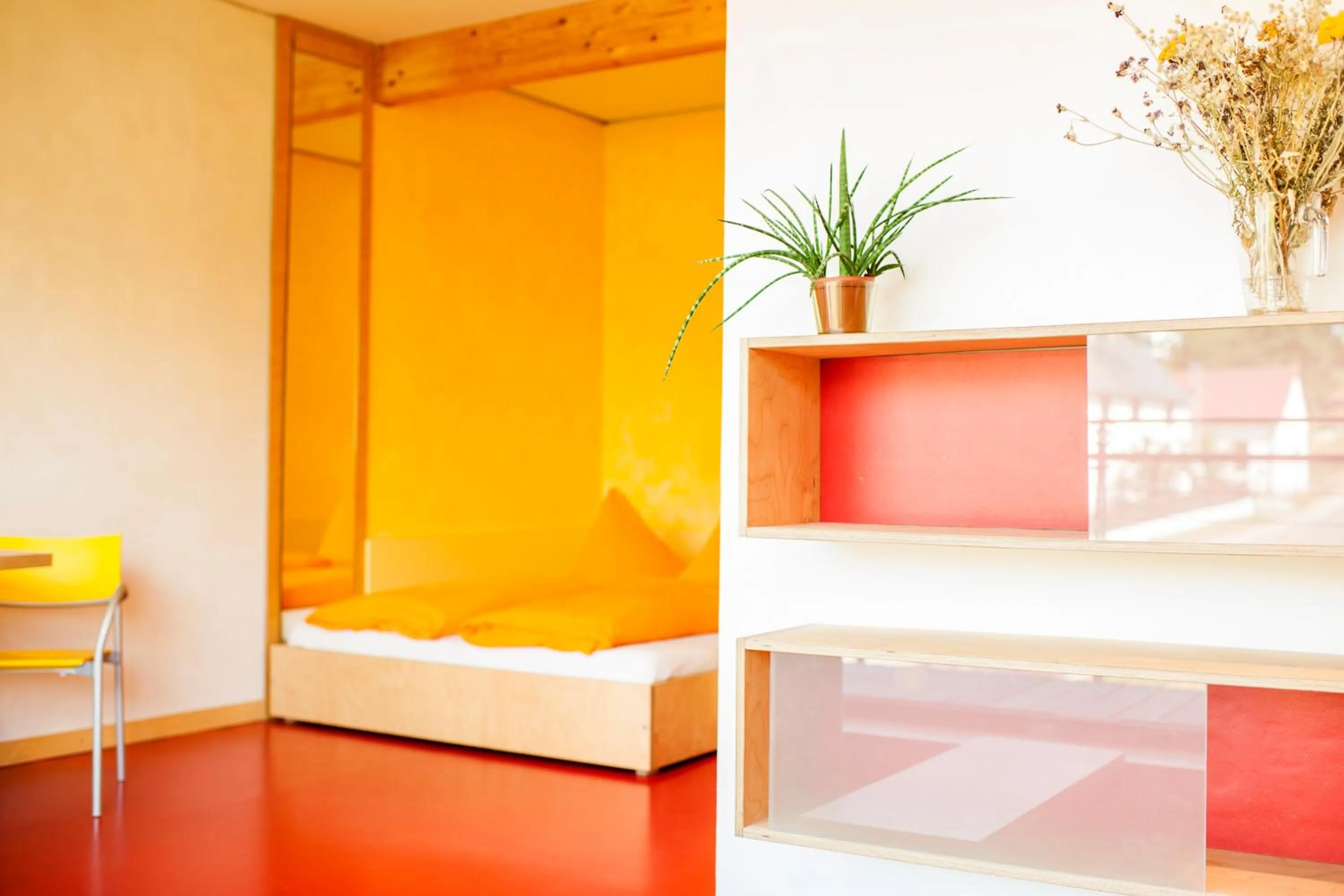 Photo of the whole room, Bed in SELBSTgemacht