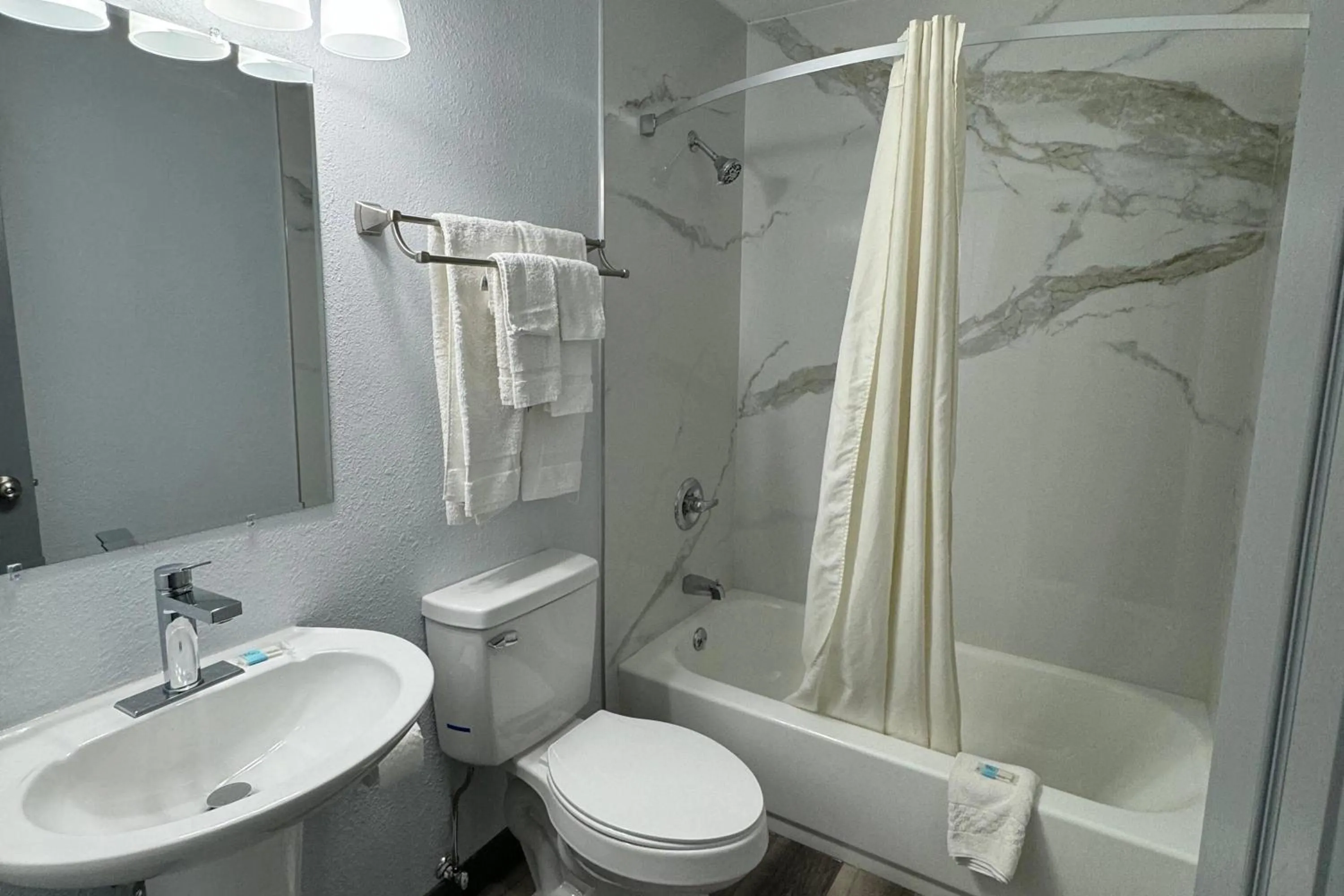 Bathroom in Travelodge by Wyndham Gainesville