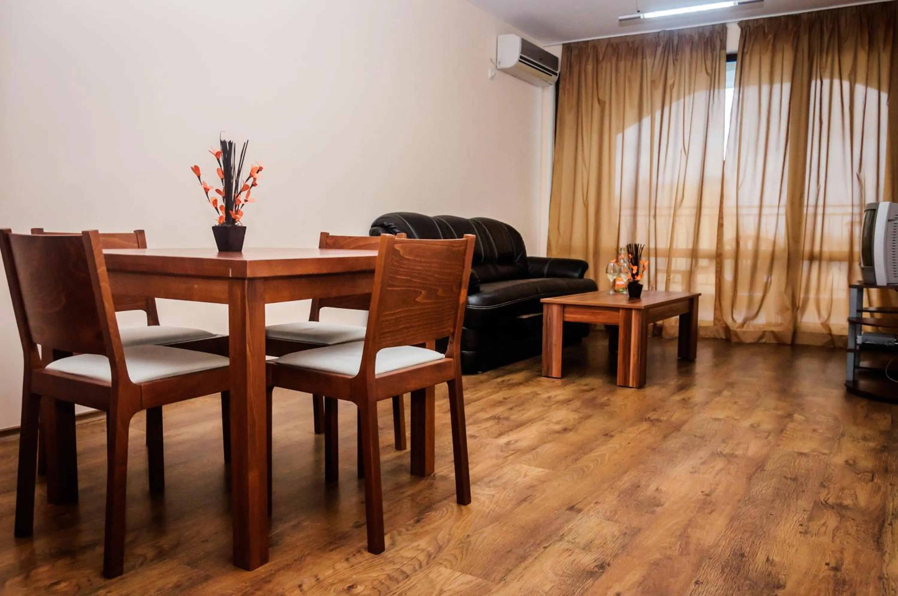 Living room in Cantilena Complex