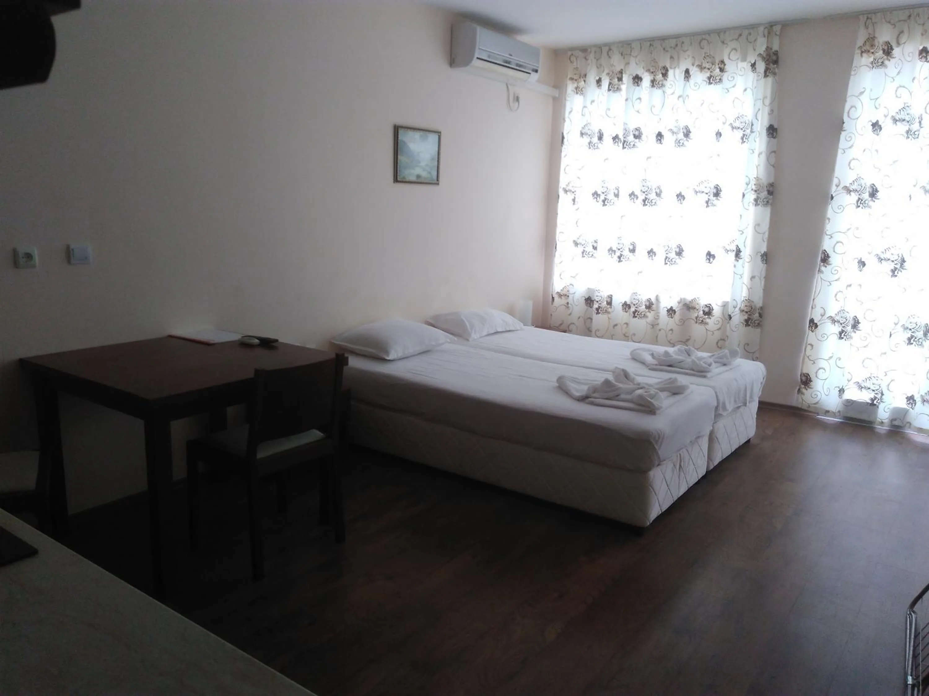 Living room, Bed in Cantilena Complex