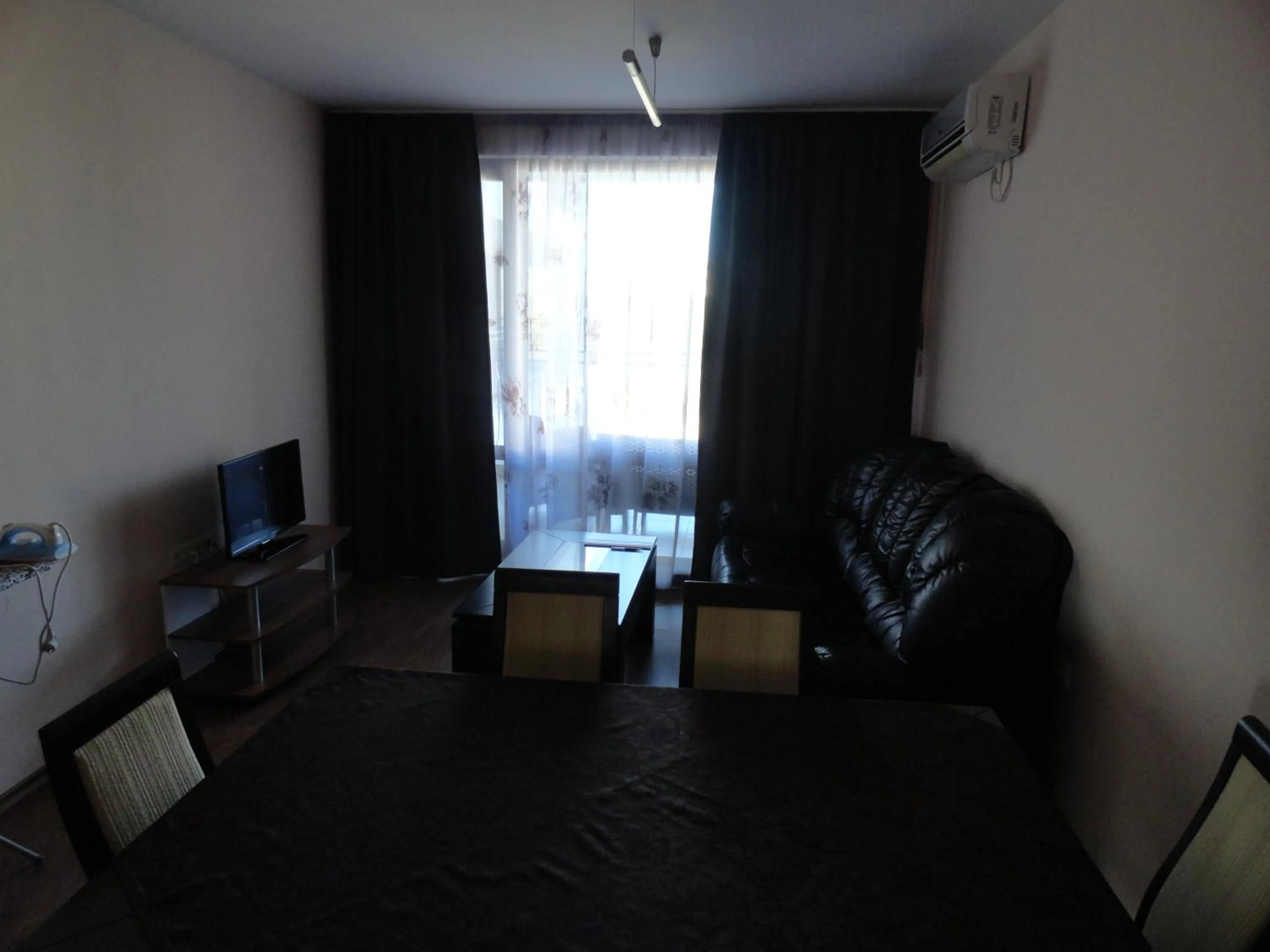 Living room in Cantilena Complex