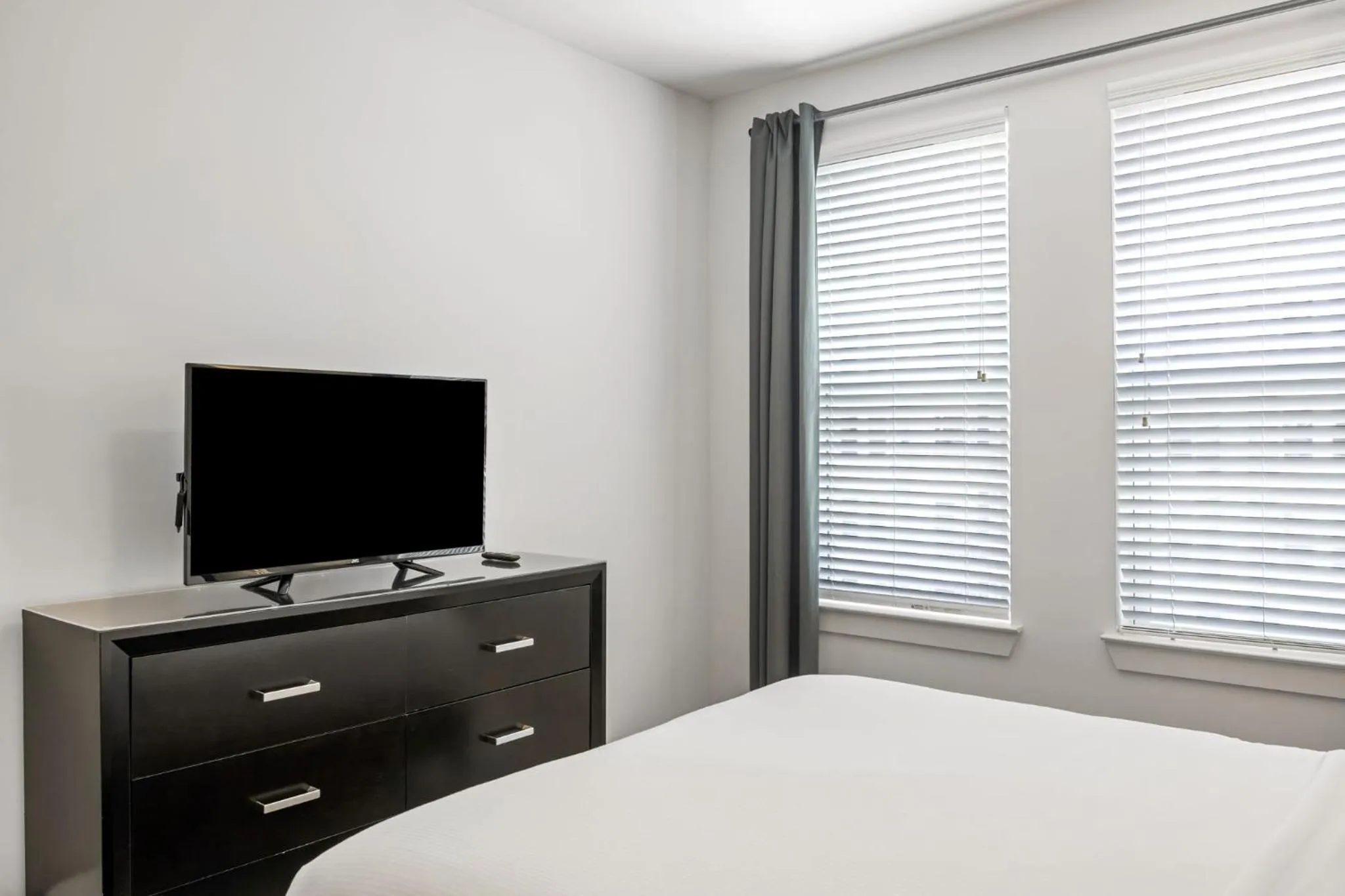 Bed in BCA Furnished Apartments