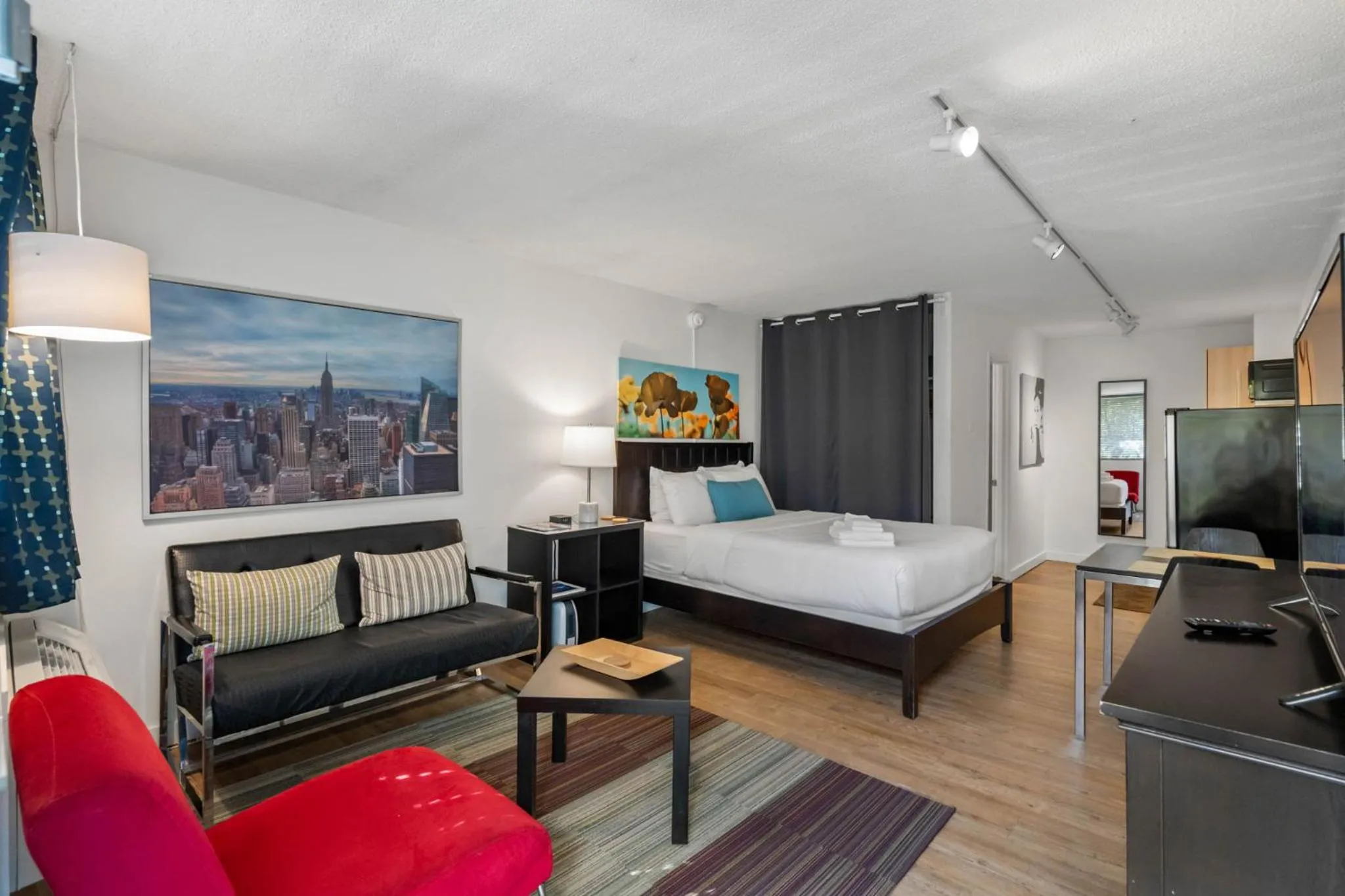 Communal lounge/ TV room, Bed in BCA Furnished Apartments