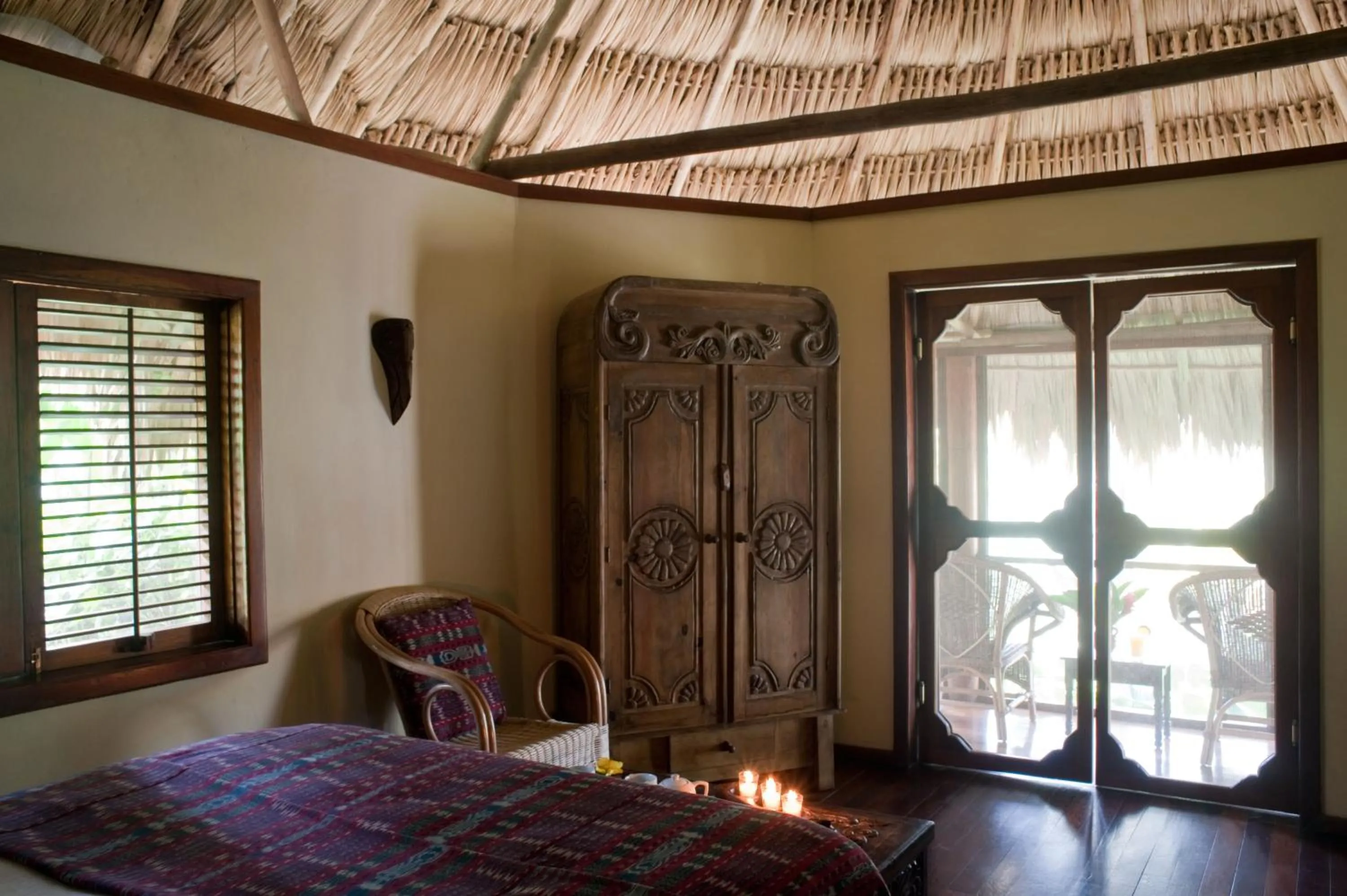 Balcony/Terrace, Bed in Blancaneaux Lodge by Francis Ford Coppola