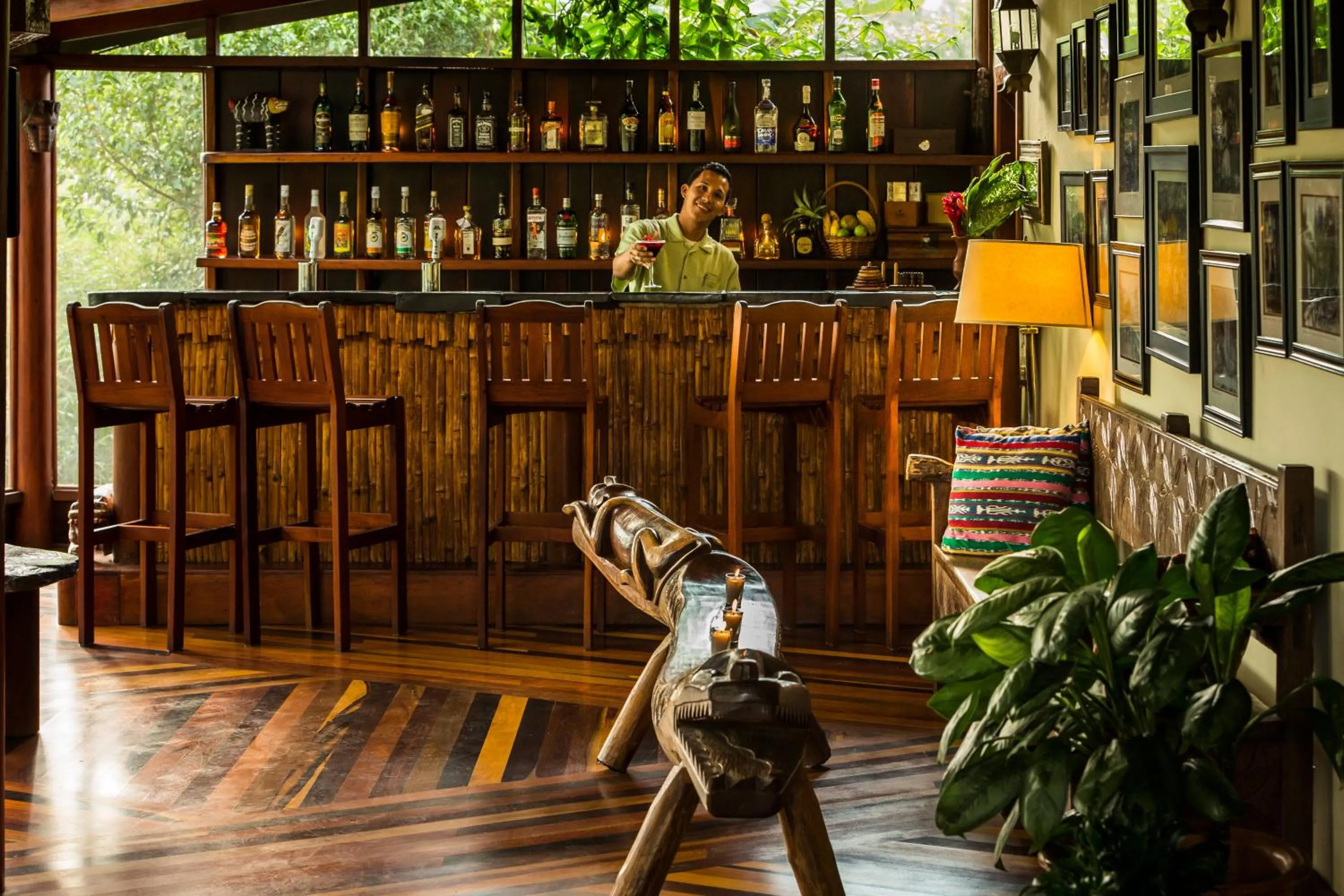 Lounge or bar in Blancaneaux Lodge by Francis Ford Coppola