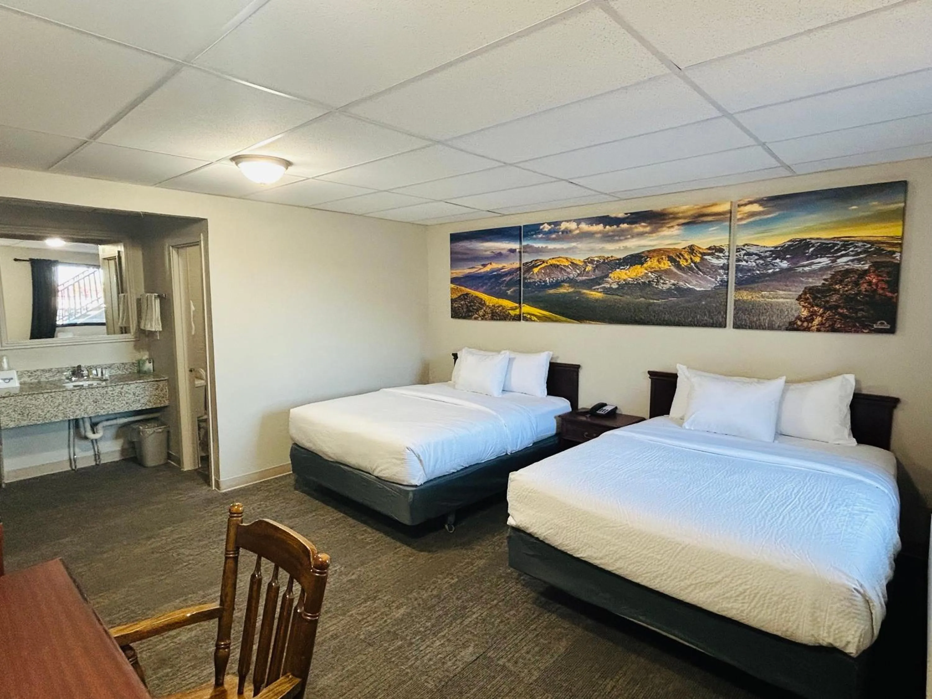 Bed in Wheatland Steamboat Inn