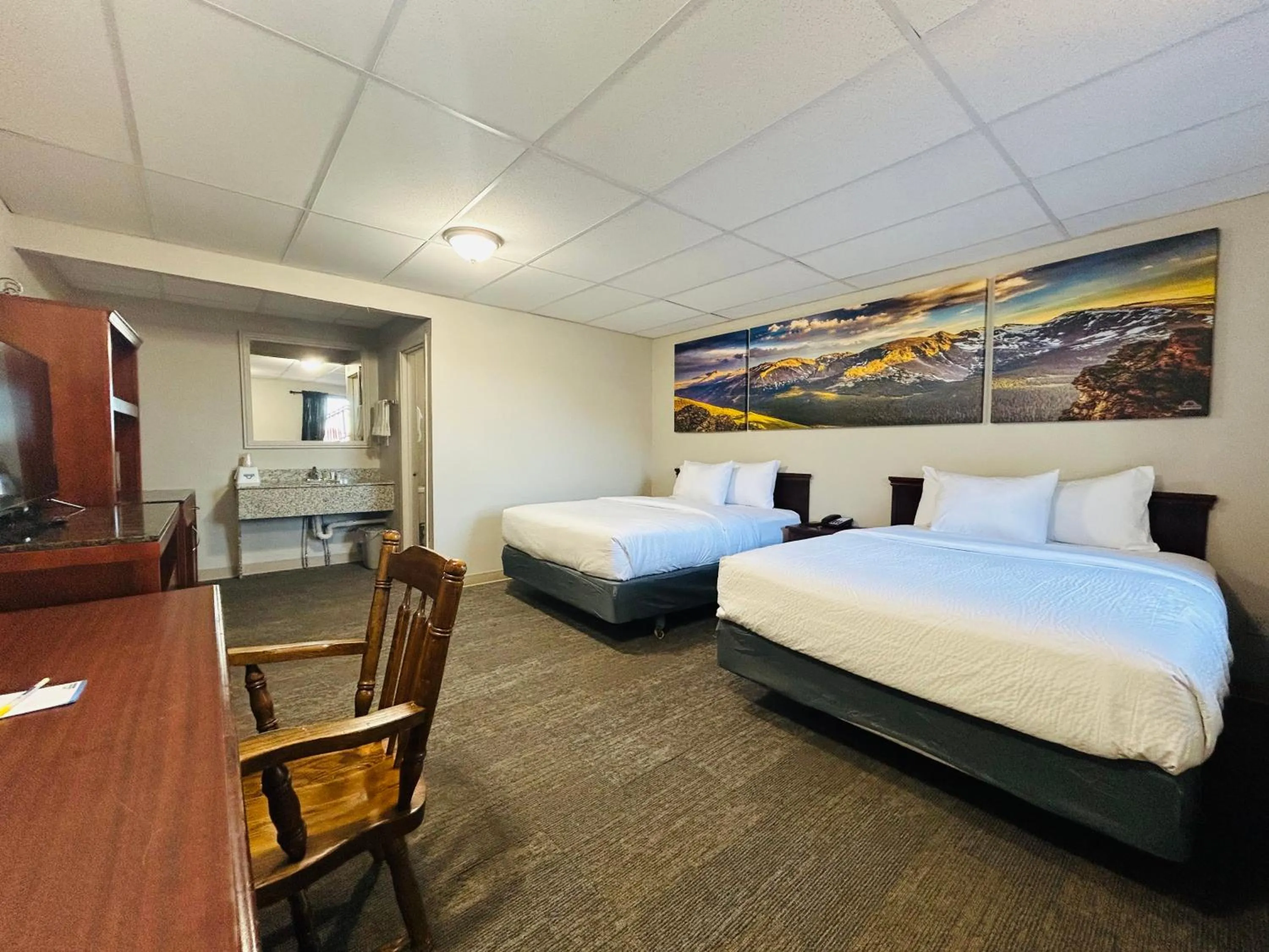 Bed in Wheatland Steamboat Inn