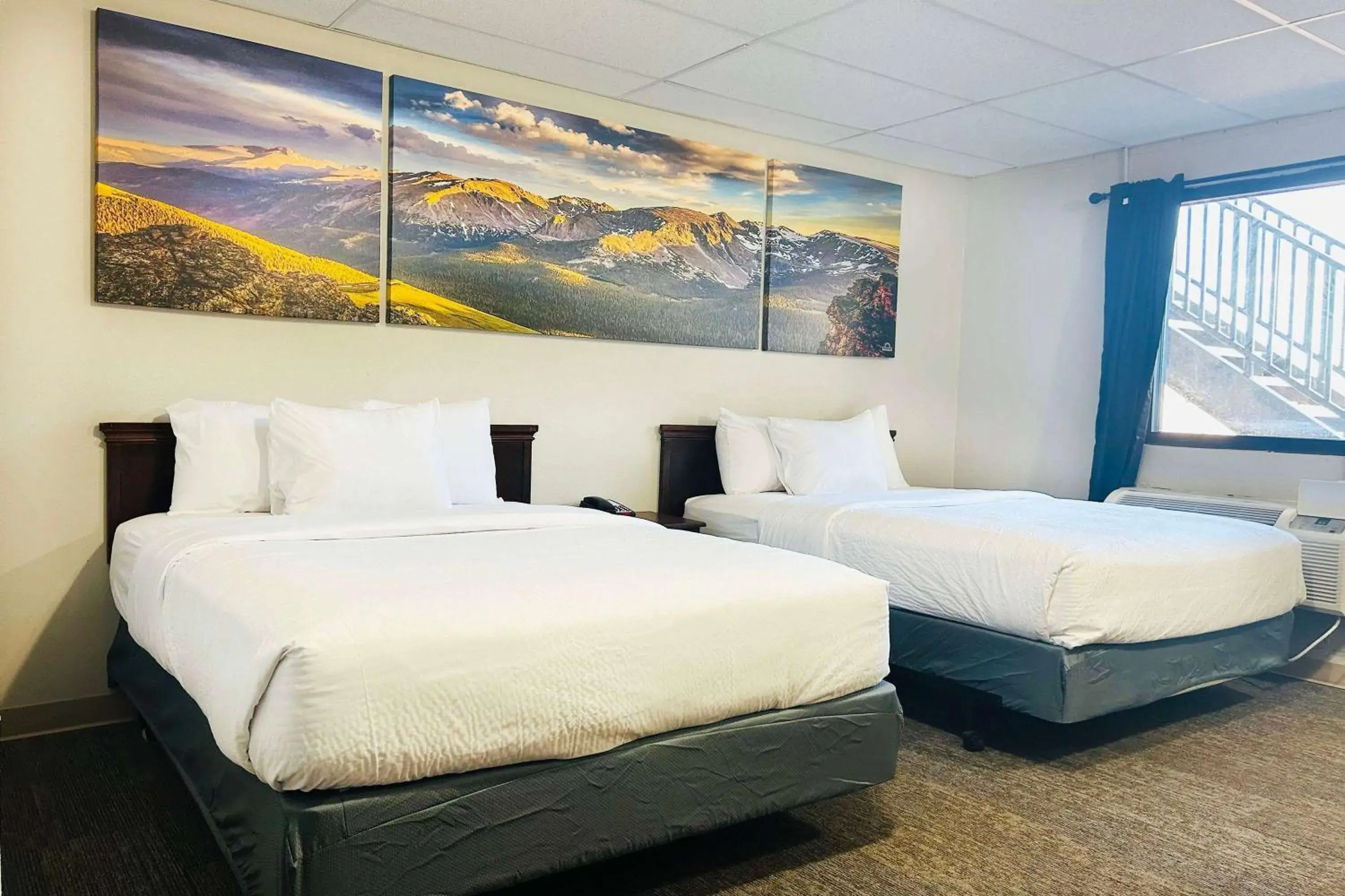 Queen Room with Two Queen Beds - Pet Friendly/Non-Smoking in Wheatland Steamboat Inn Queen Room with Two Queen Beds - Pet Friendly/Non-Smoking in Wheatland Steamboat Inn