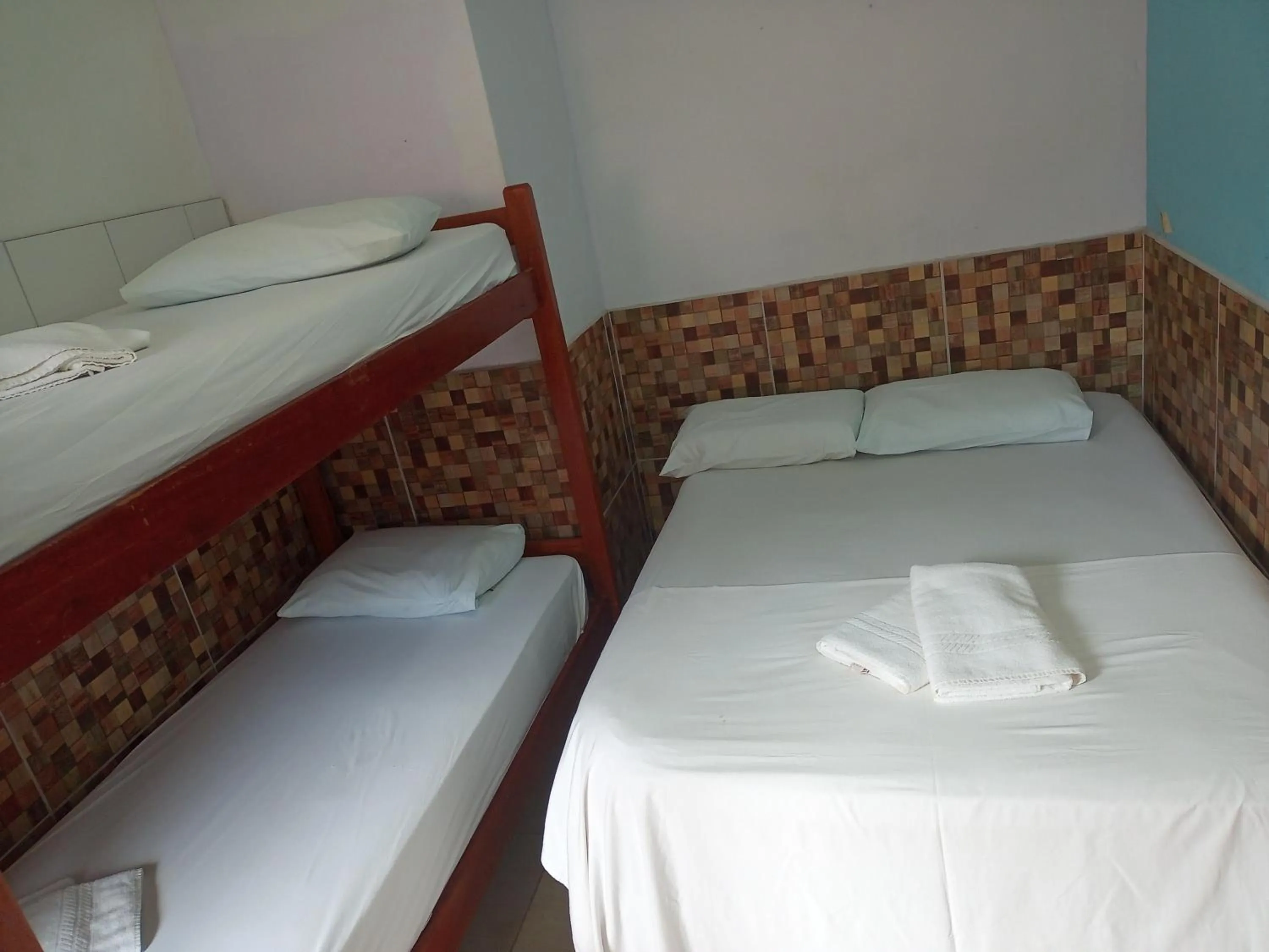 Bed in Pousada Recanto do Amanhecer