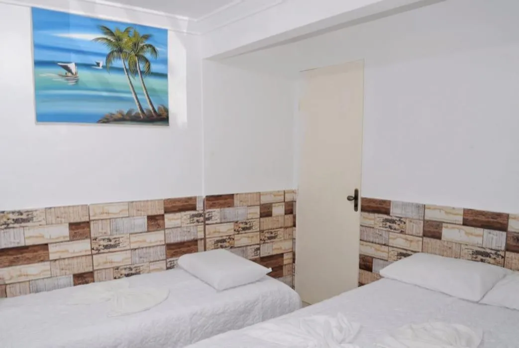 Bed in Pousada Recanto do Amanhecer