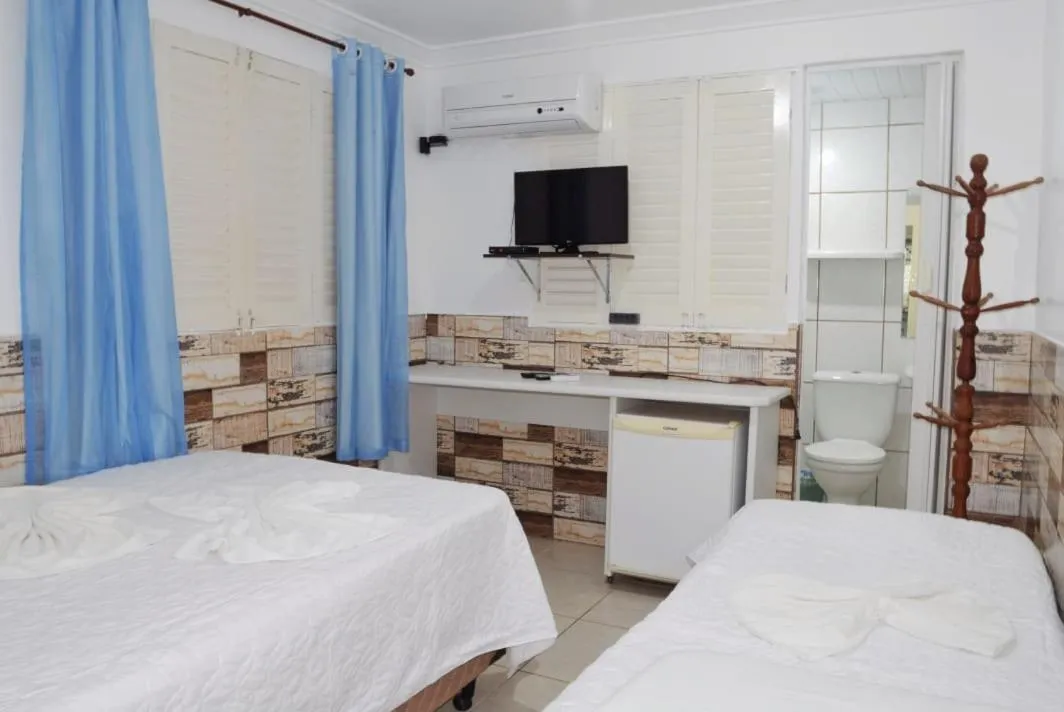 Bed in Pousada Recanto do Amanhecer