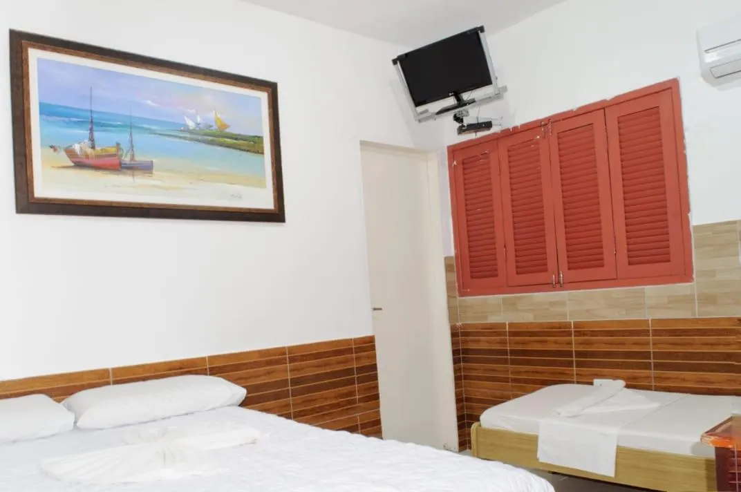 Bed in Pousada Recanto do Amanhecer