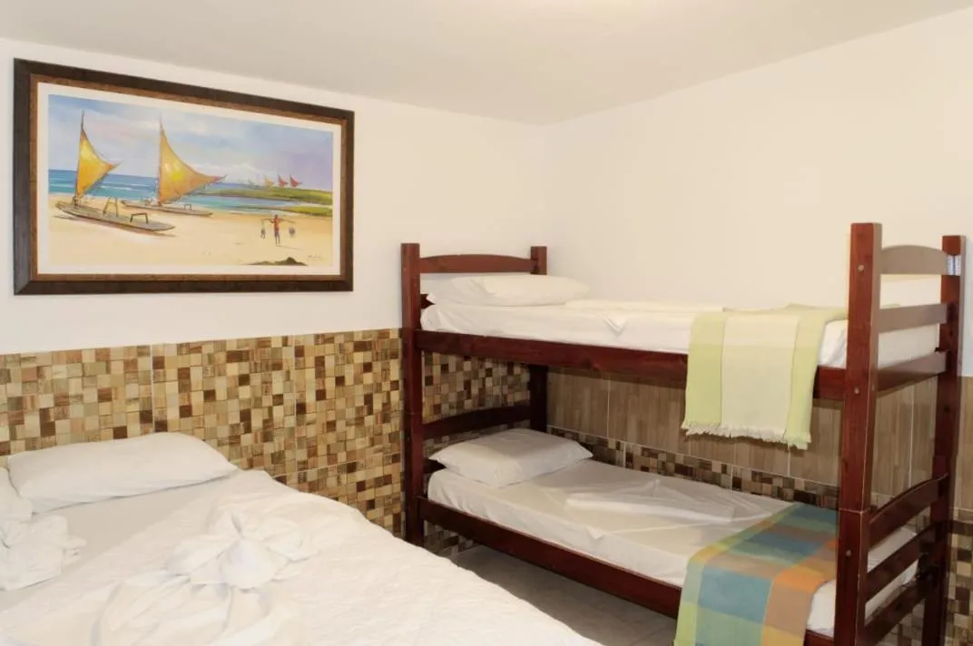 Bed in Pousada Recanto do Amanhecer