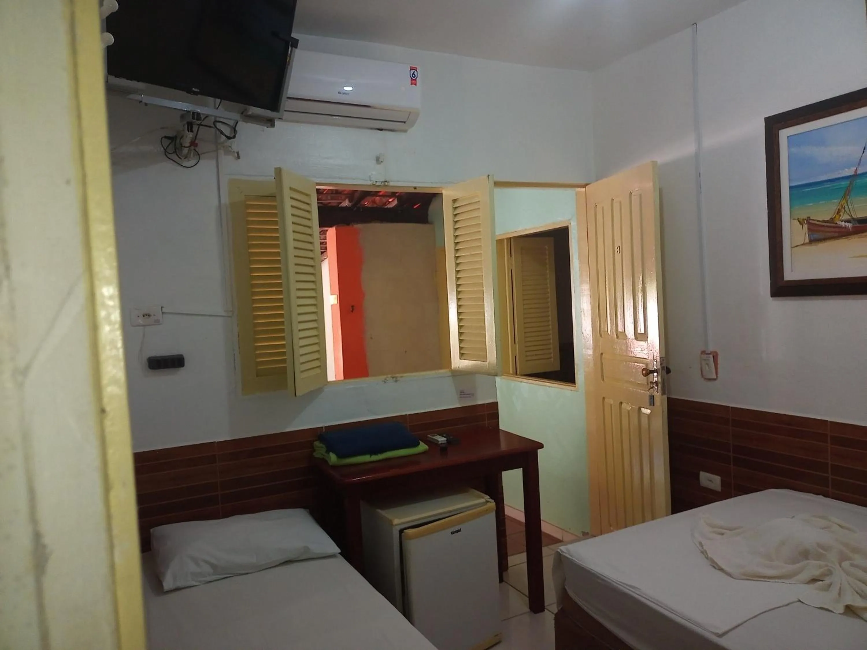 Bed in Pousada Recanto do Amanhecer