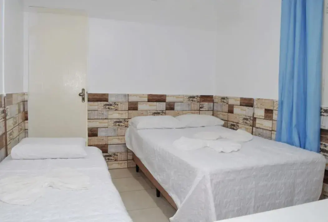 Triple Room in Pousada Recanto do Amanhecer Triple Room in Pousada Recanto do Amanhecer