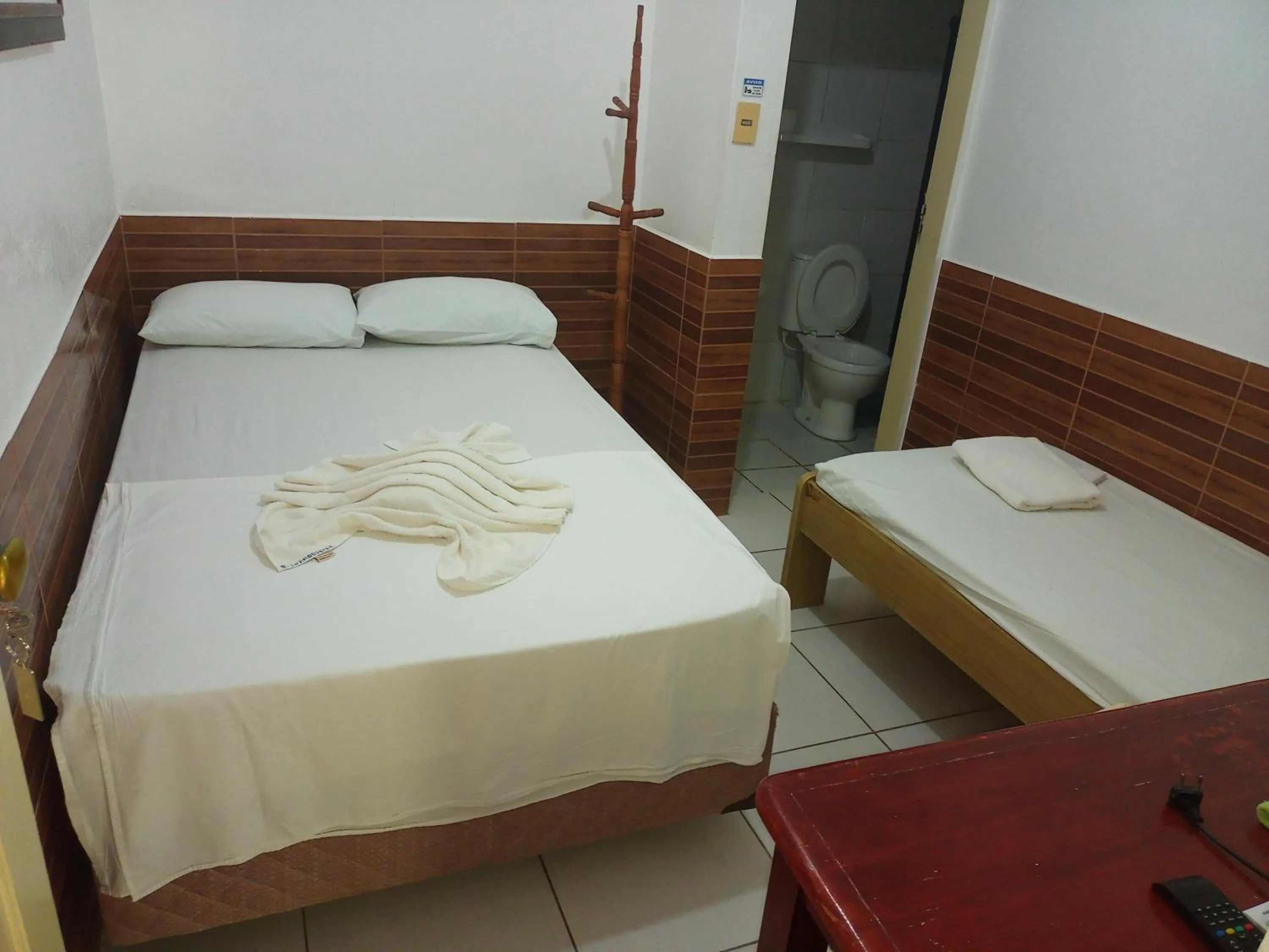 Bed in Pousada Recanto do Amanhecer