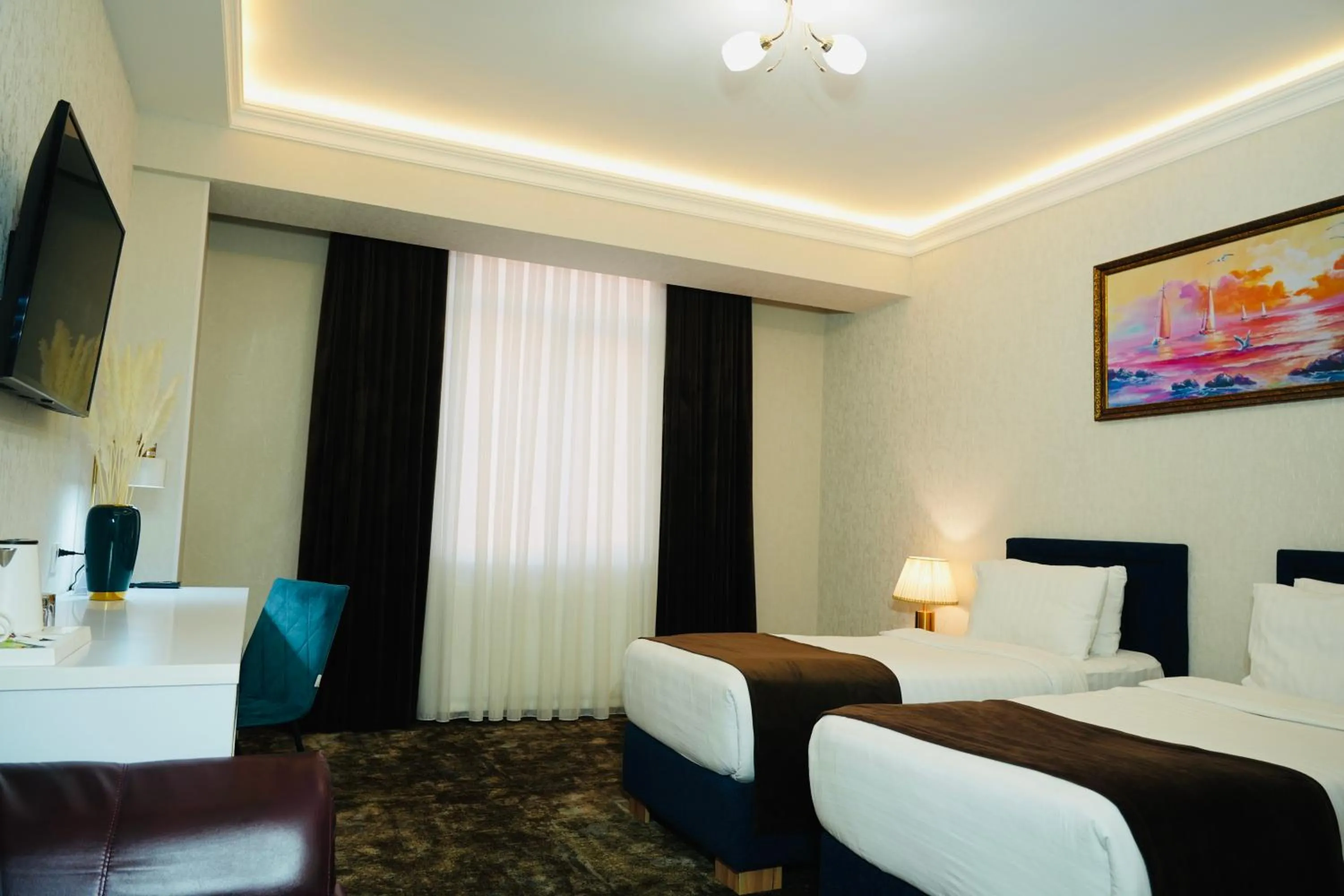 Bed in Garnet Mir Hotel