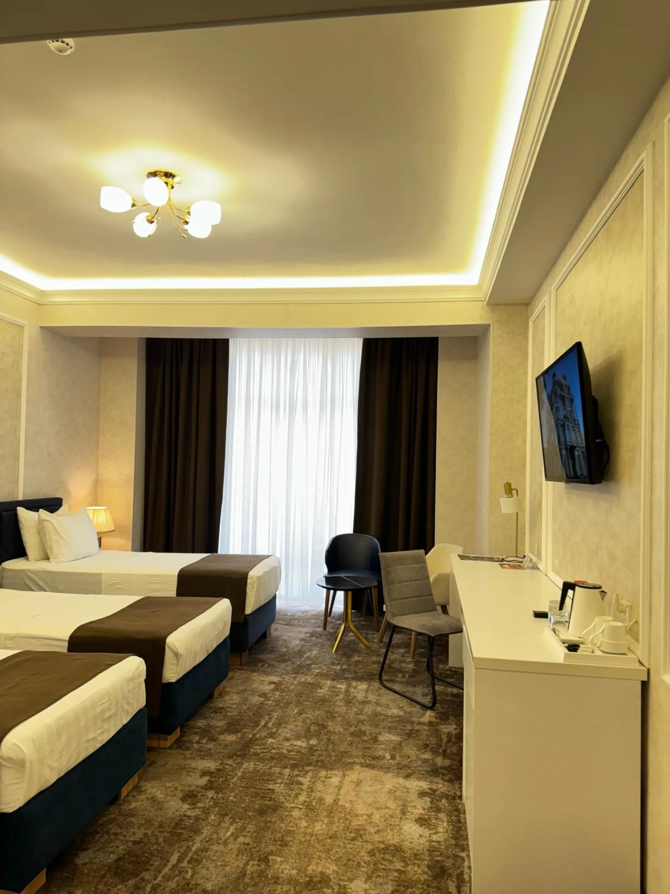 Bed in Garnet Mir Hotel