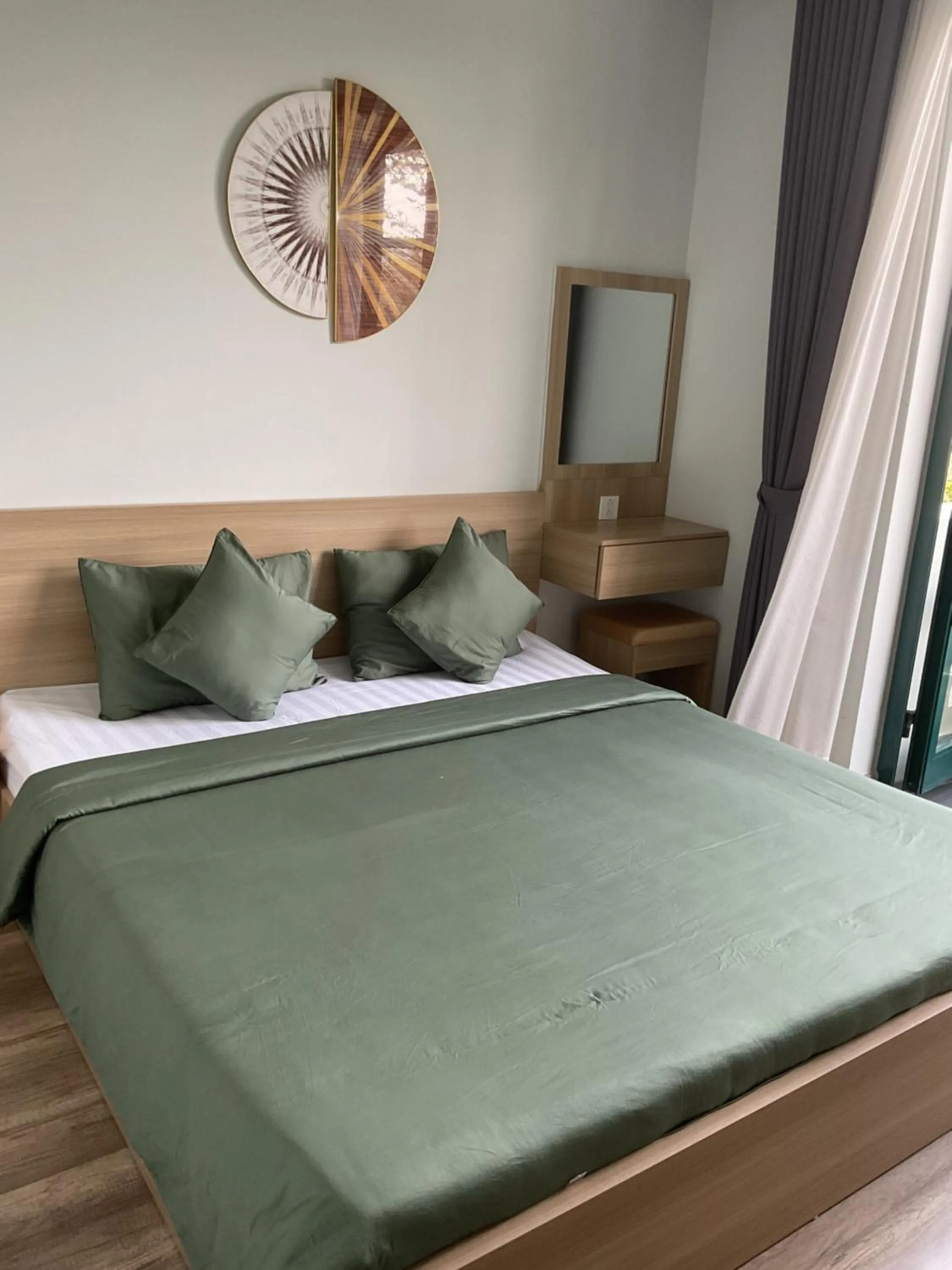 Bed in Green Inn Phu Quoc Hotel