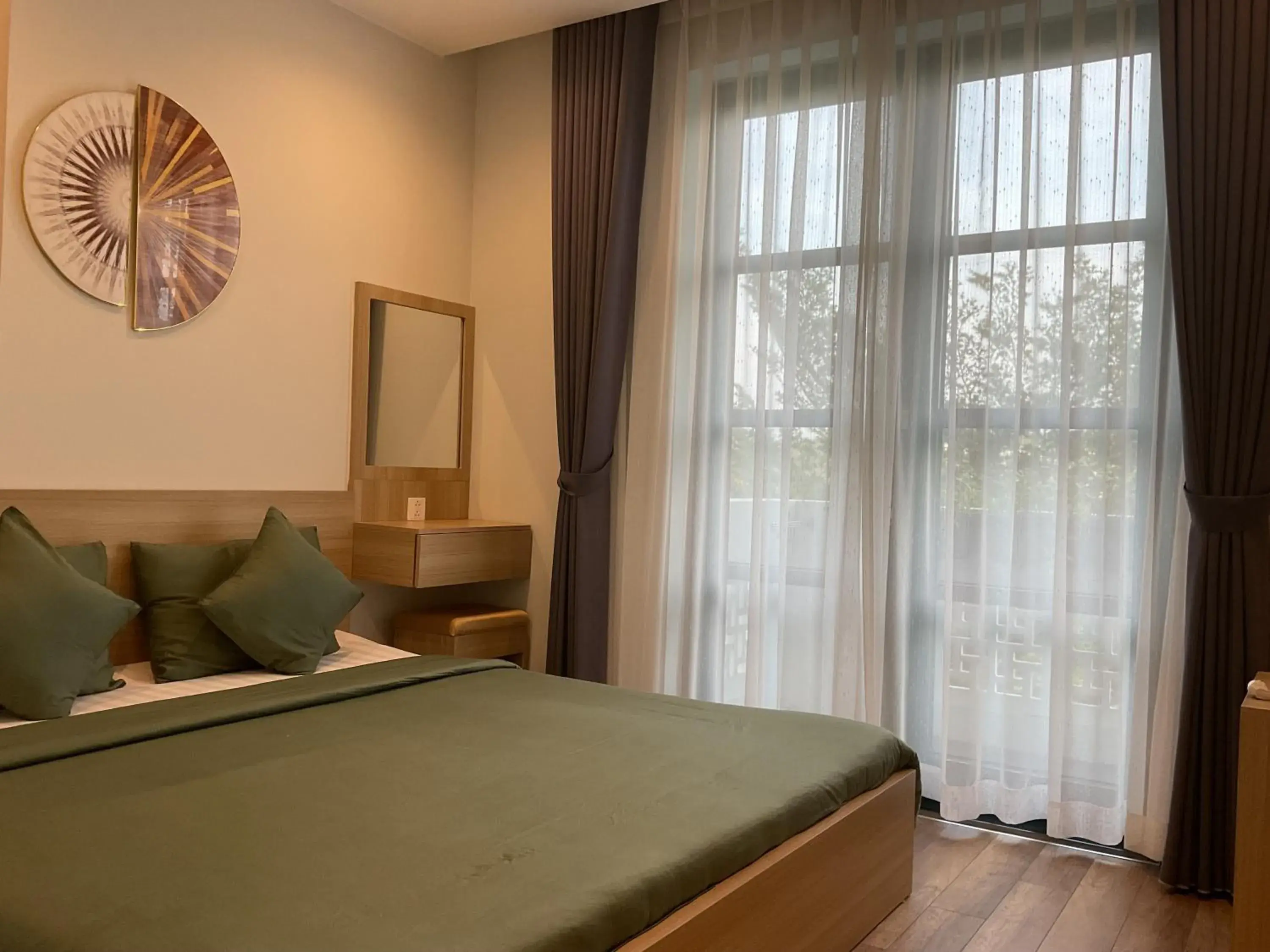 Deluxe Double Room with Balcony - single occupancy in Green Inn Phu Quoc Hotel Deluxe Double Room with Balcony - single occupancy in Green Inn Phu Quoc Hotel