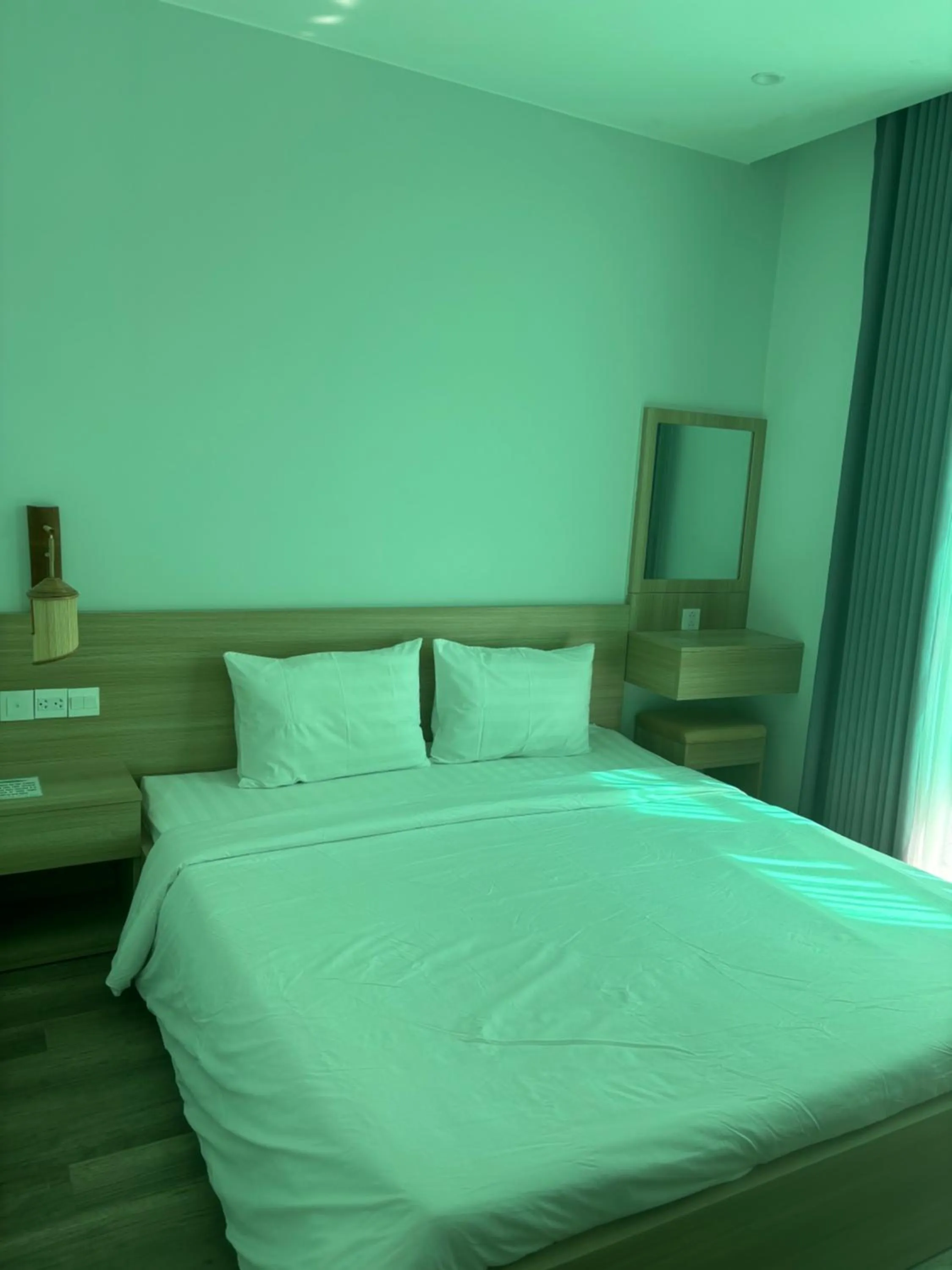 Bed in Green Inn Phu Quoc Hotel