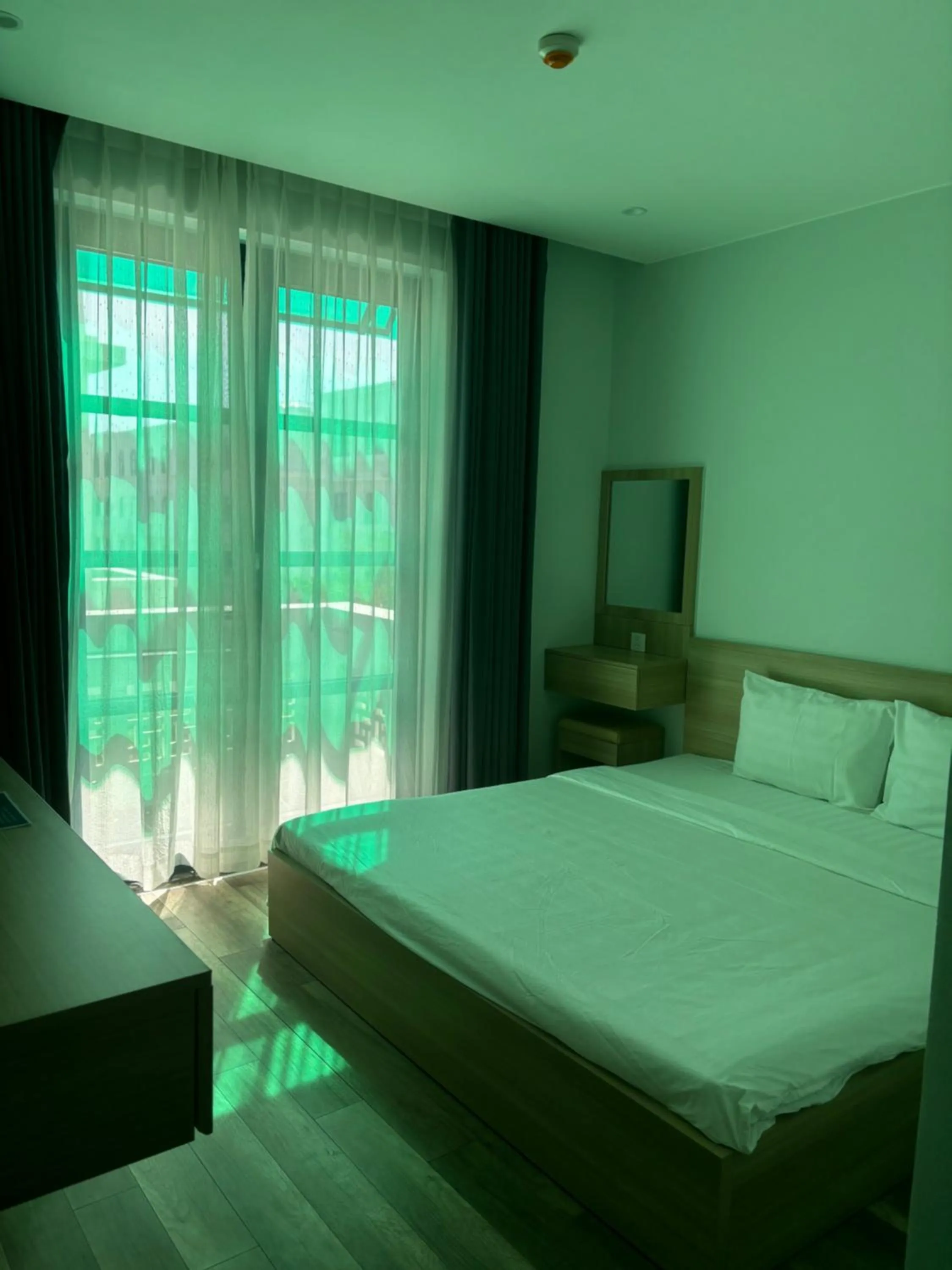 Bed in Green Inn Phu Quoc Hotel