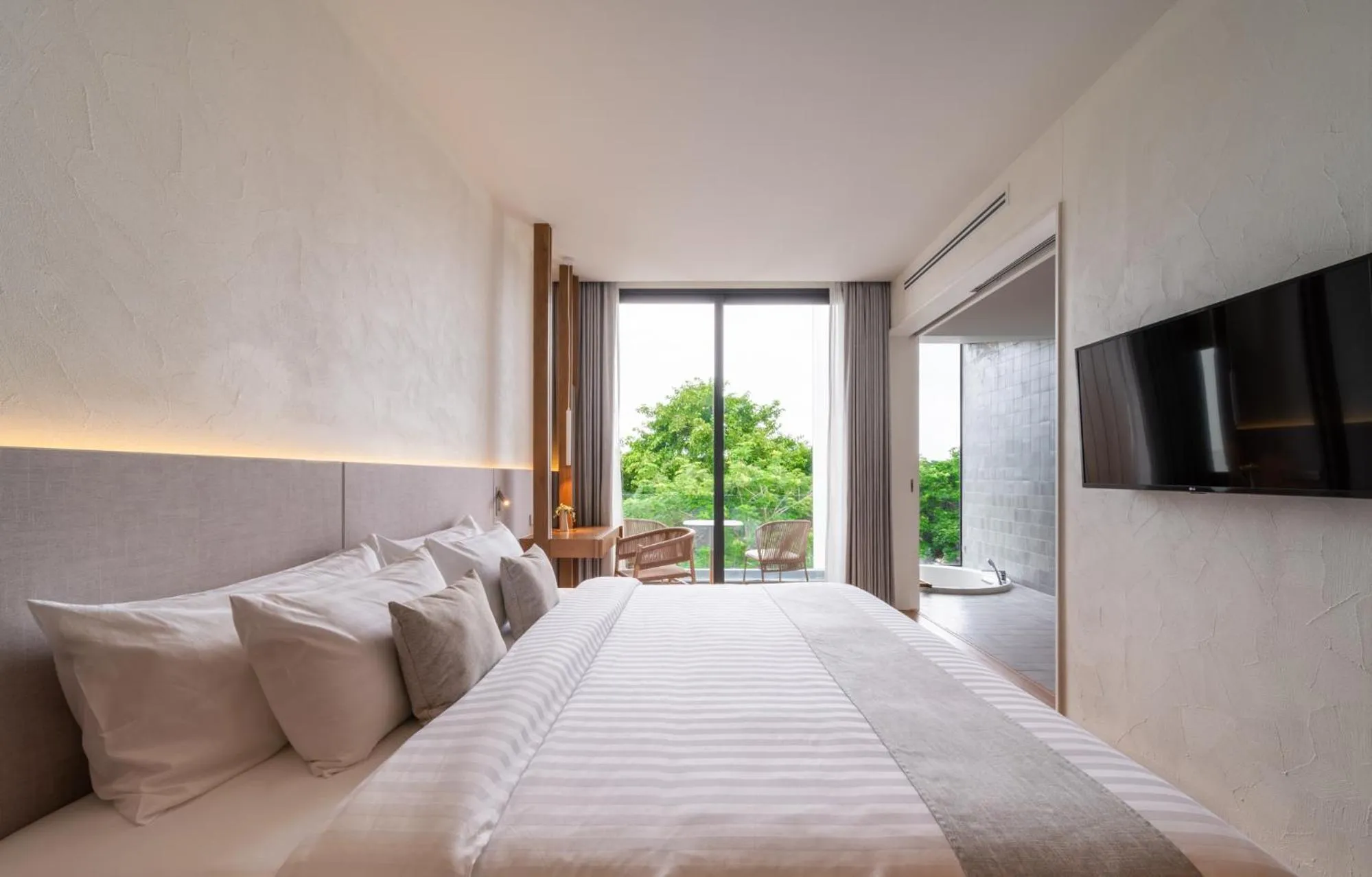 Bed in Riva Vista Riverfront Resort Chiang Rai