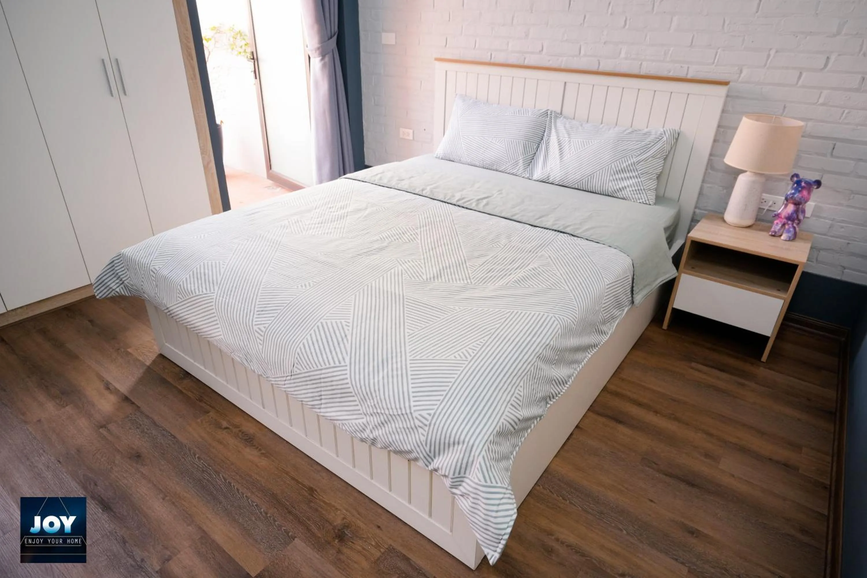 Bed in JOY APARTMENT TAY HO