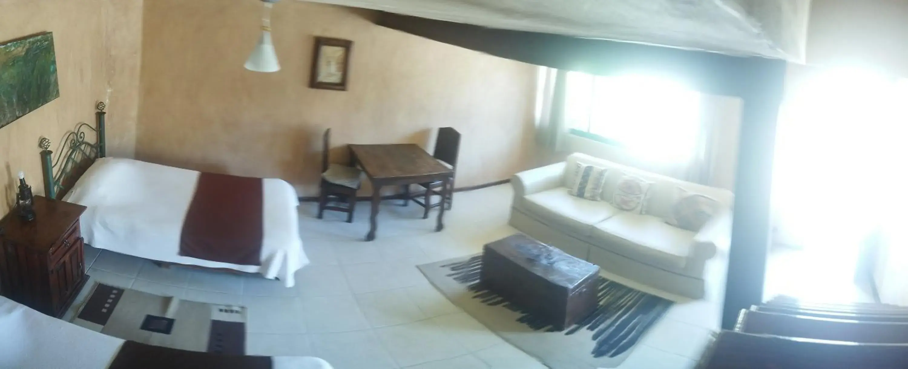 Basic Triple Room with Shared Bathroom in Hosteria Covadonga Basic Triple Room with Shared Bathroom in Hosteria Covadonga