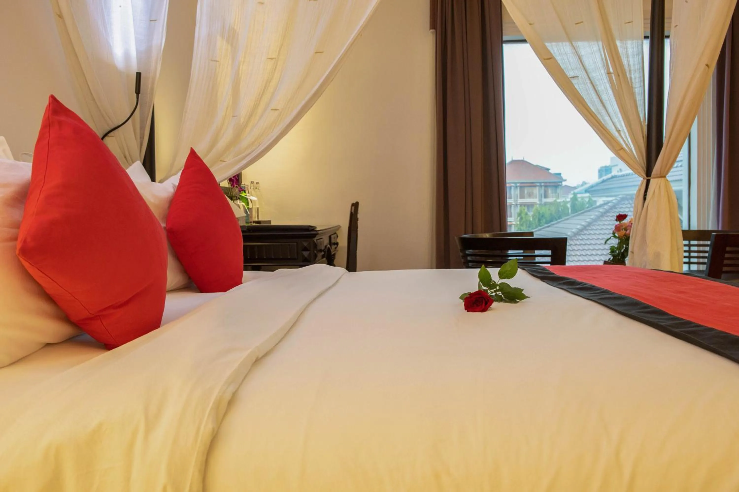 Bed in La Rose Suites