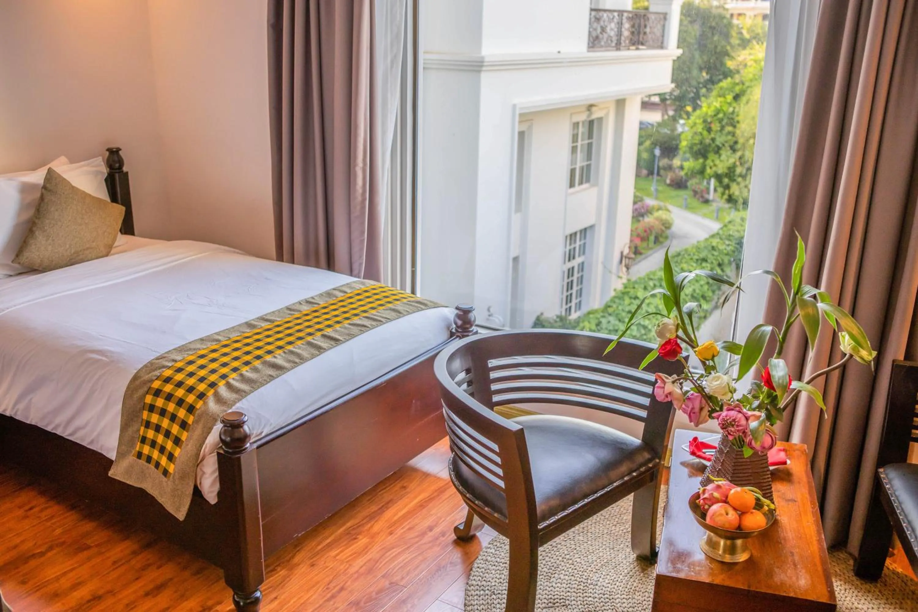 Bed in La Rose Suites