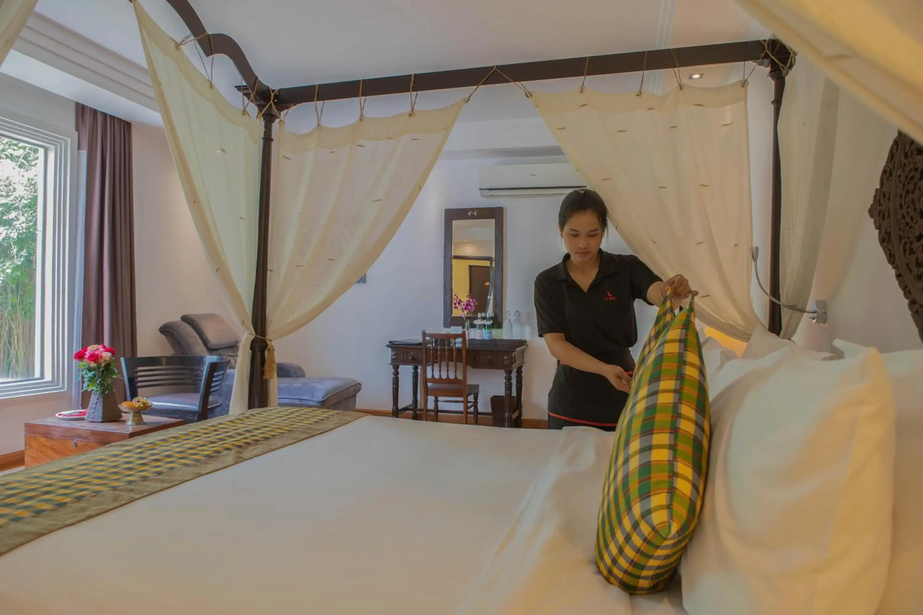 Bed in La Rose Suites Bed in La Rose Suites