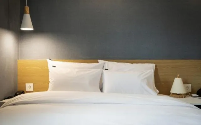 Bed in Hotel Yaja Gwangalli