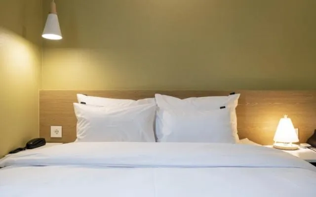 Bed in Hotel Yaja Gwangalli