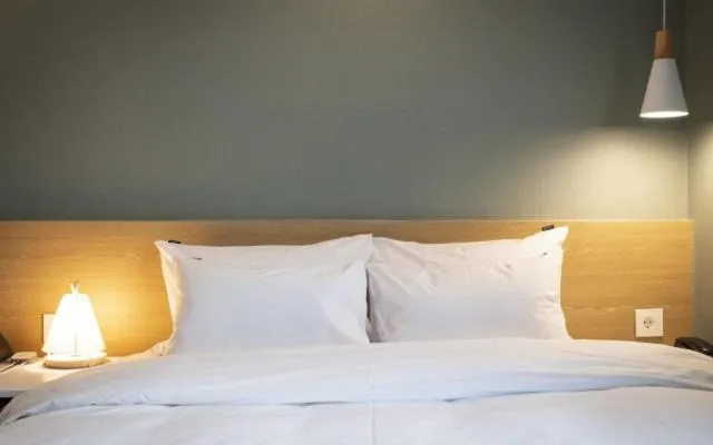 Bed in Hotel Yaja Gwangalli