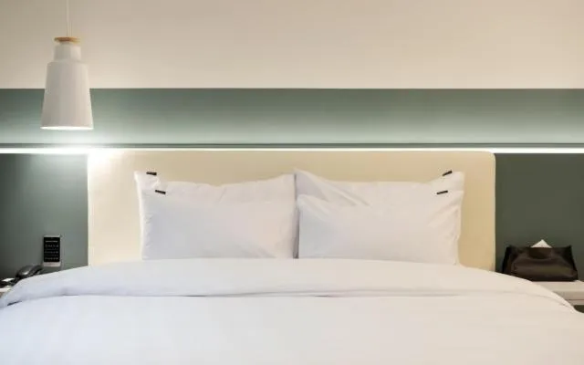 Bed in Hotel Yaja Gwangalli