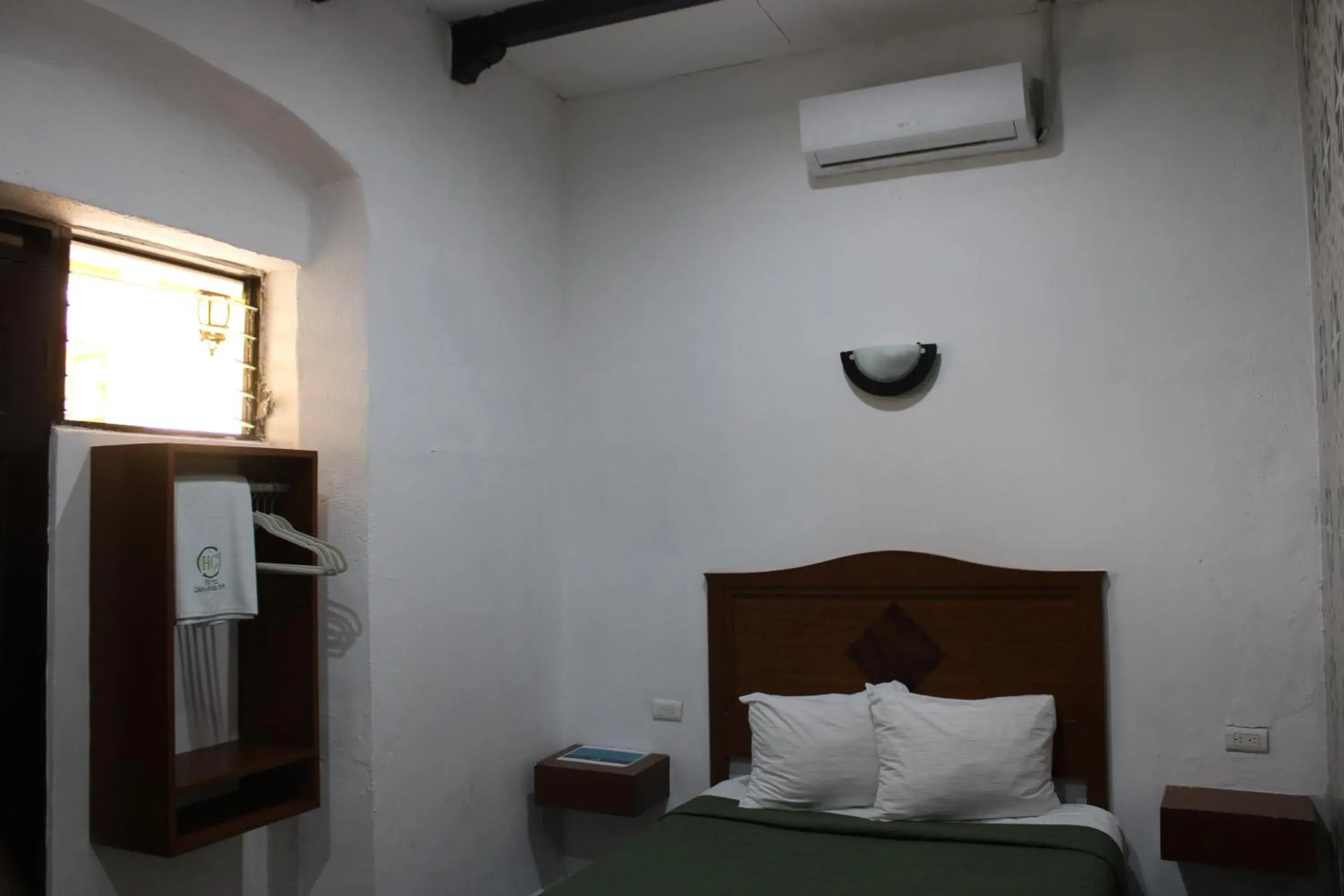 Bed in Hotel Guaranducha Inn Bed in Hotel Guaranducha Inn