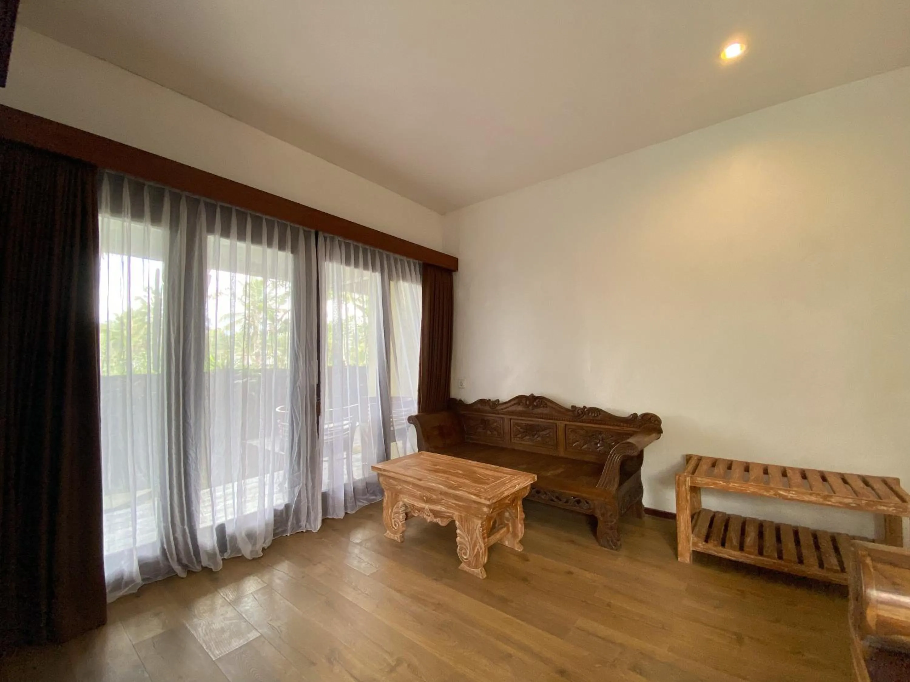 Living room in Uma Linggah Resort by Puri Signatures