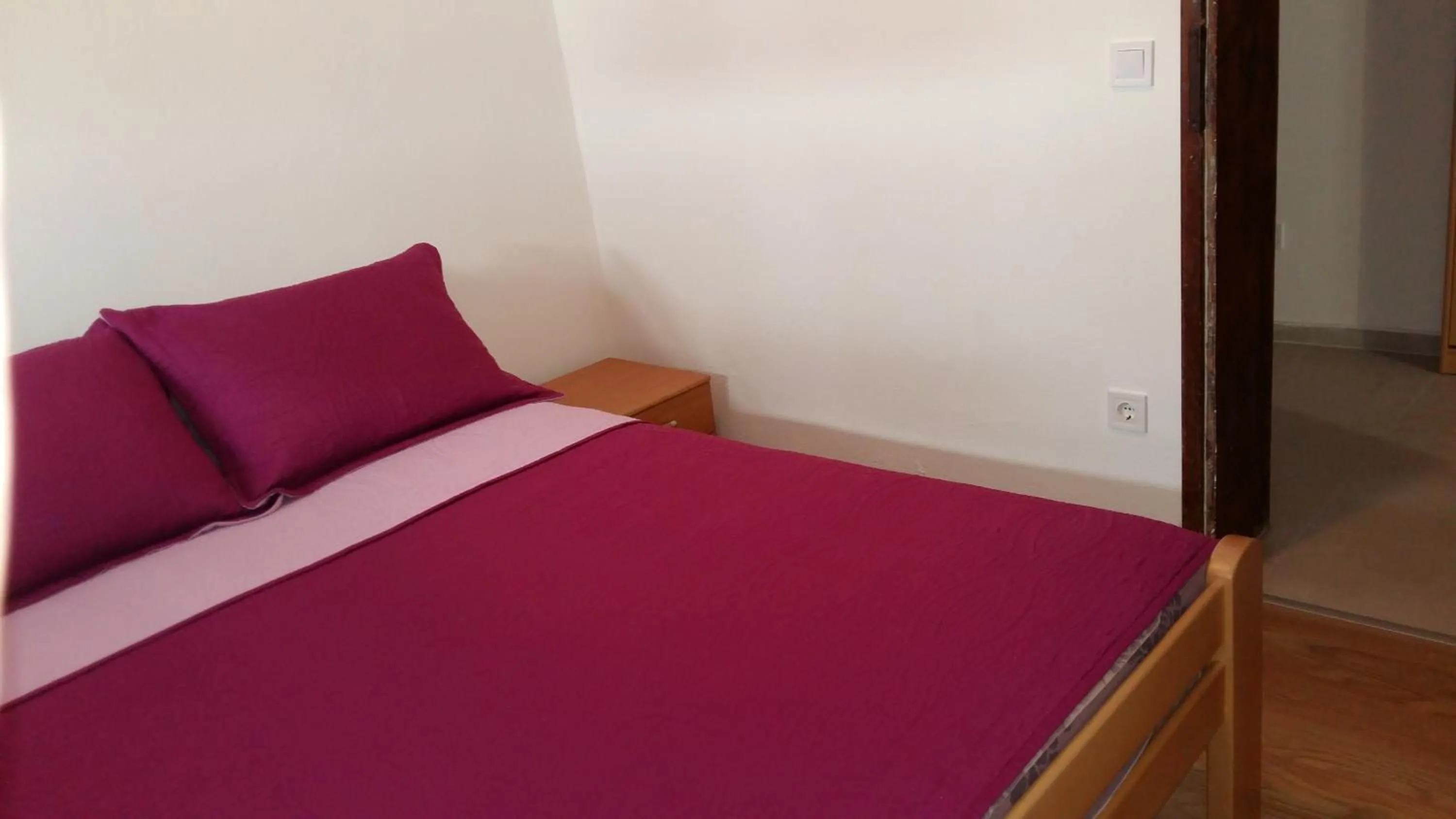 Bed in Lazar Apartments