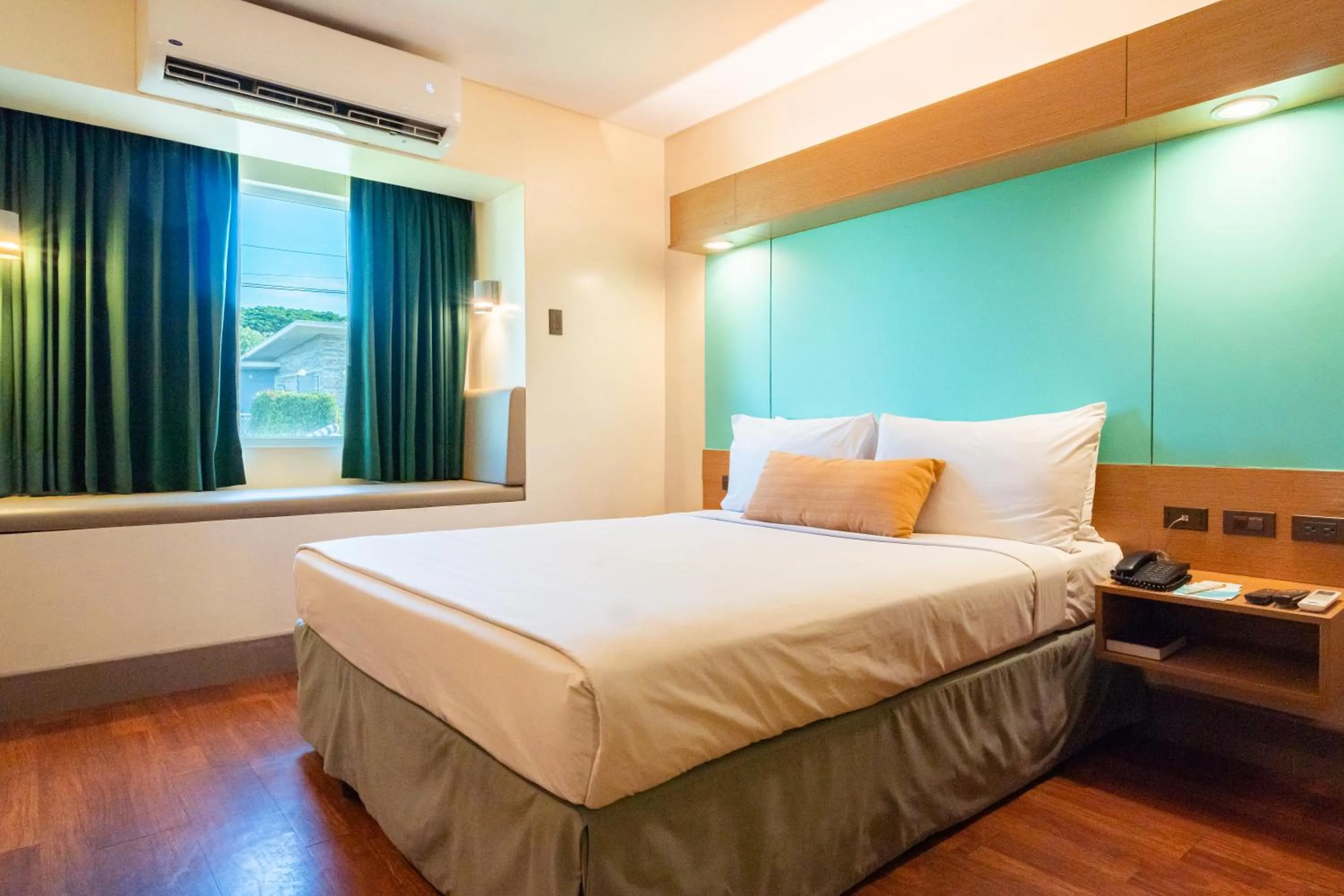 Bedroom, Bed in Microtel by Wyndham South Forbes near Nuvali