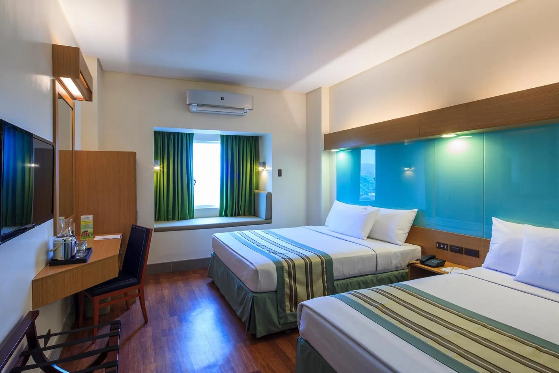 Photo of the whole room, Bed in Microtel by Wyndham South Forbes near Nuvali