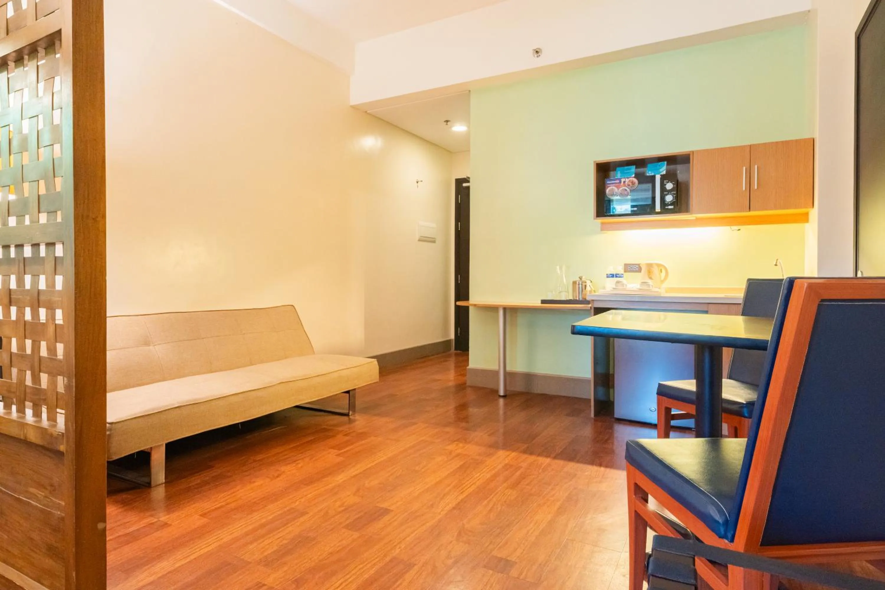 Living room in Microtel by Wyndham South Forbes near Nuvali