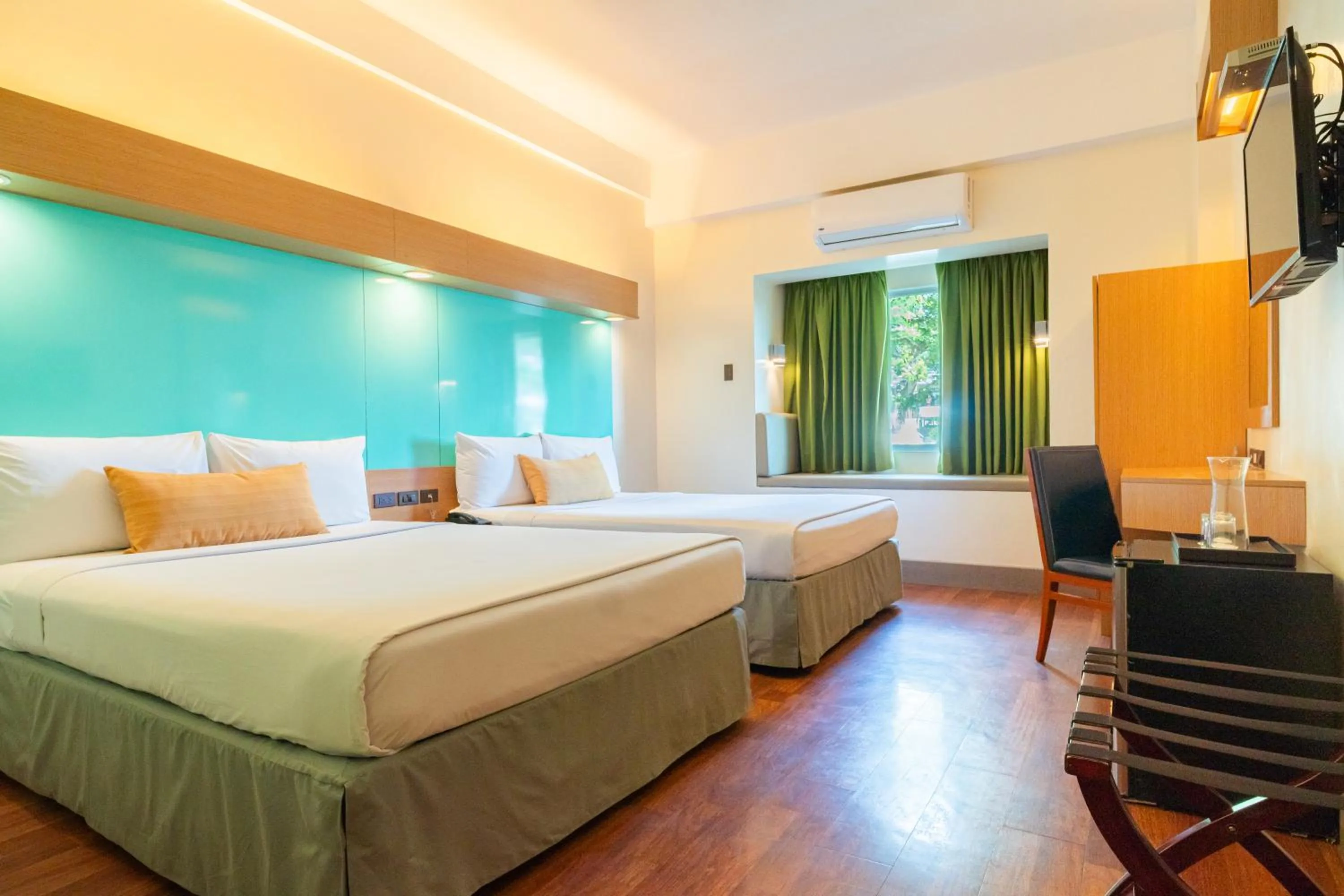 Photo of the whole room, Bed in Microtel by Wyndham South Forbes near Nuvali